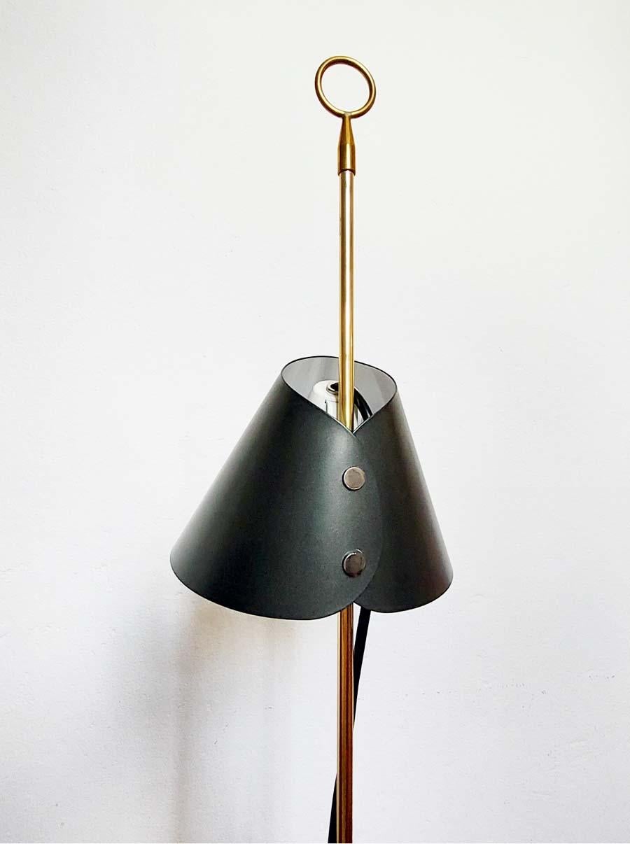 Iconic lamp designed by Luigi Caccia Dominioni for Azucena in 1953. The Monachella lamp takes its name from the black veil worn by nuns because at that time Caccia Dominioni was working on the Convent and Institute of the Beata Vergine Addolorata in