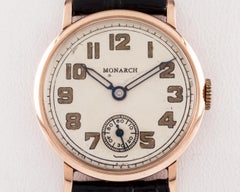Monarch 14 Karat Rose Gold Round Hand-Wind Vintage Watch with Leather Band