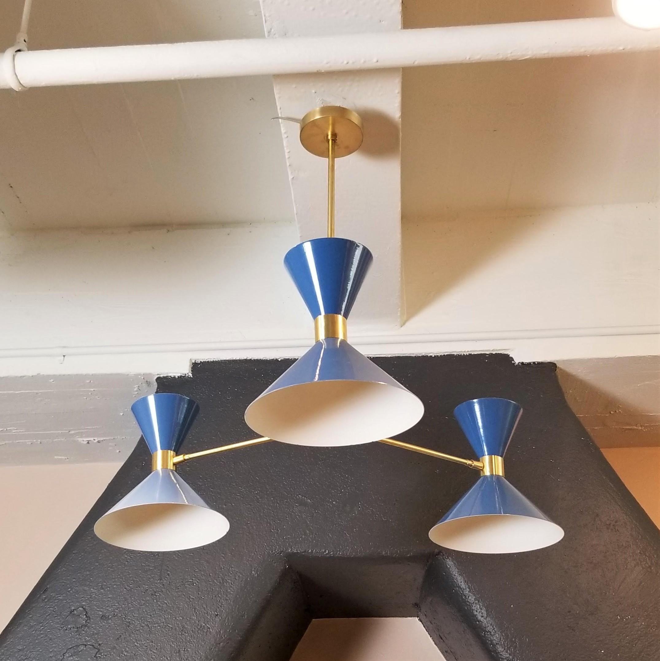 Il pendente a 3 bracci o piccolo lampadario 