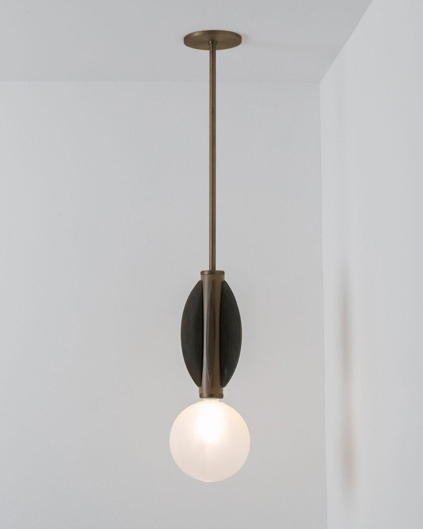 Monarch Brushed Brass Ceiling Mounted Lamp by Carla Baz
Dimensions: Ø 16 X H 112 cm.
Materials: Tala Marrón marble and brushed bronze.
Weight: 8 kg.

Monarch lighting series has been developed with the idea of opulence and fine details all the while