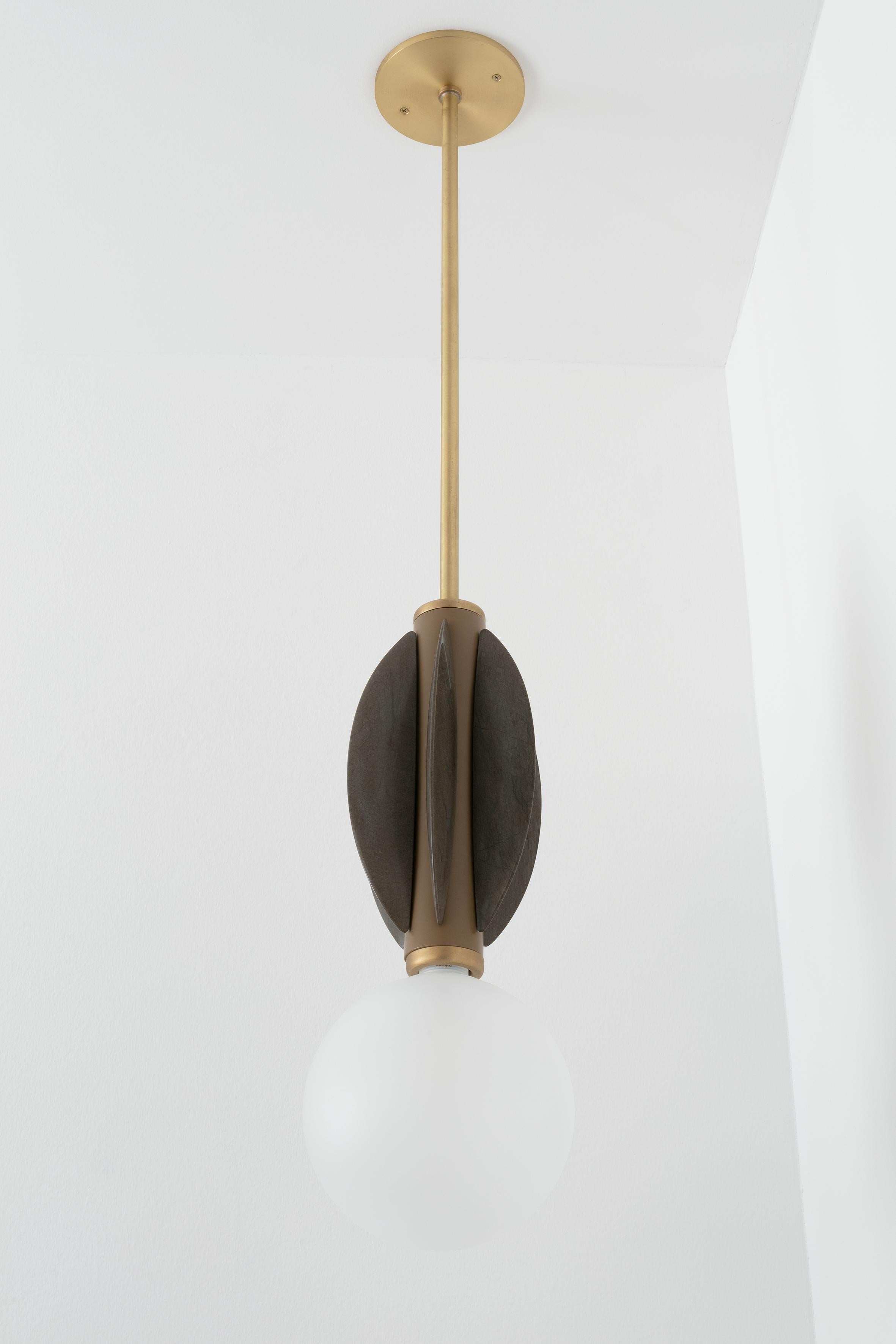 Monarch ceiling mounted - Carla Baz
Dimensions: ø 16 x H 112 cm
Weight: 6 kg
Material: Painted metal, Brass, Marble

Monarch lighting series has been developed with the idea of opulence and fine details all the while keeping with our intention of