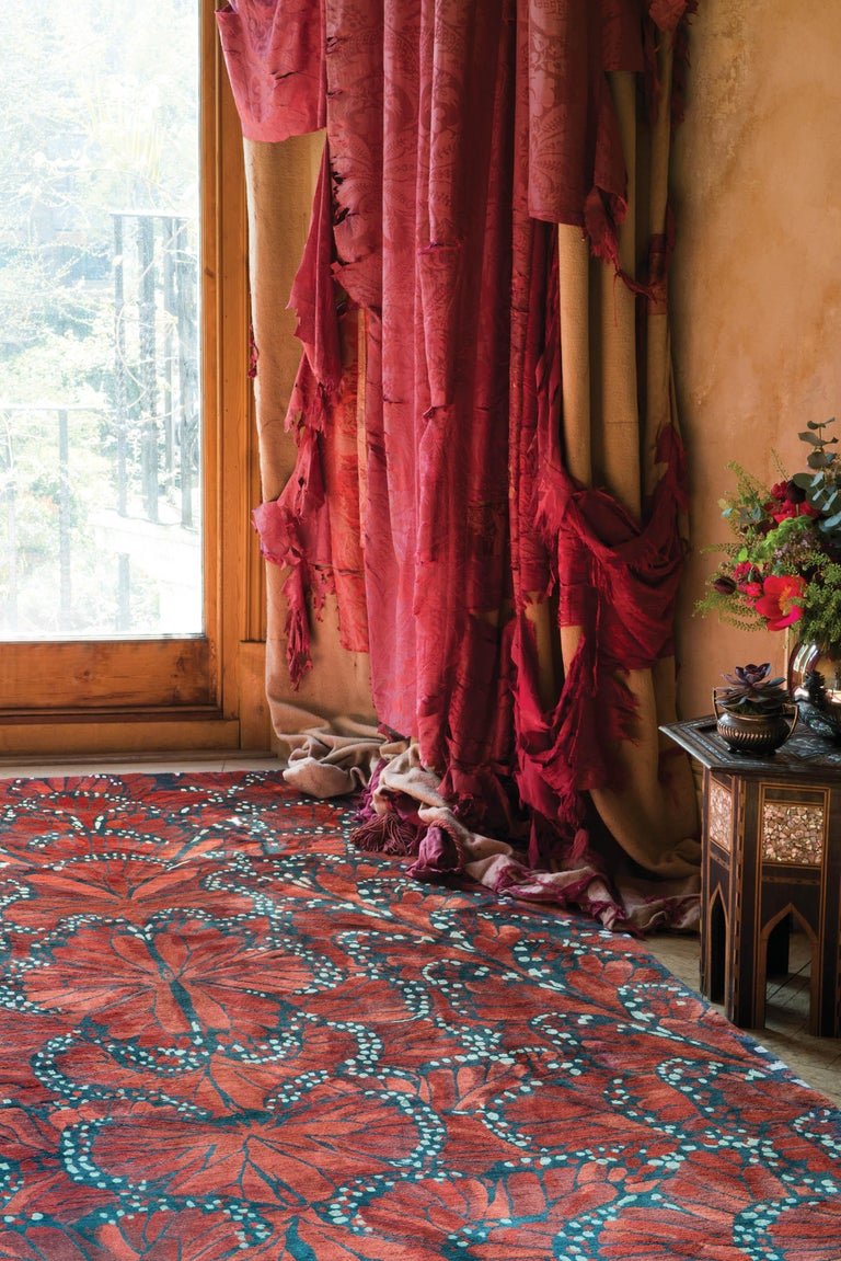 Inspired by an exquisite handcrafted feather butterfly from Sarah Burton's inaugural Folklore collection, Monarch is hand woven in silk to capture the shimmering, hypnotic movement of this delicate motif. The dramatic peppery hues of the Monarch