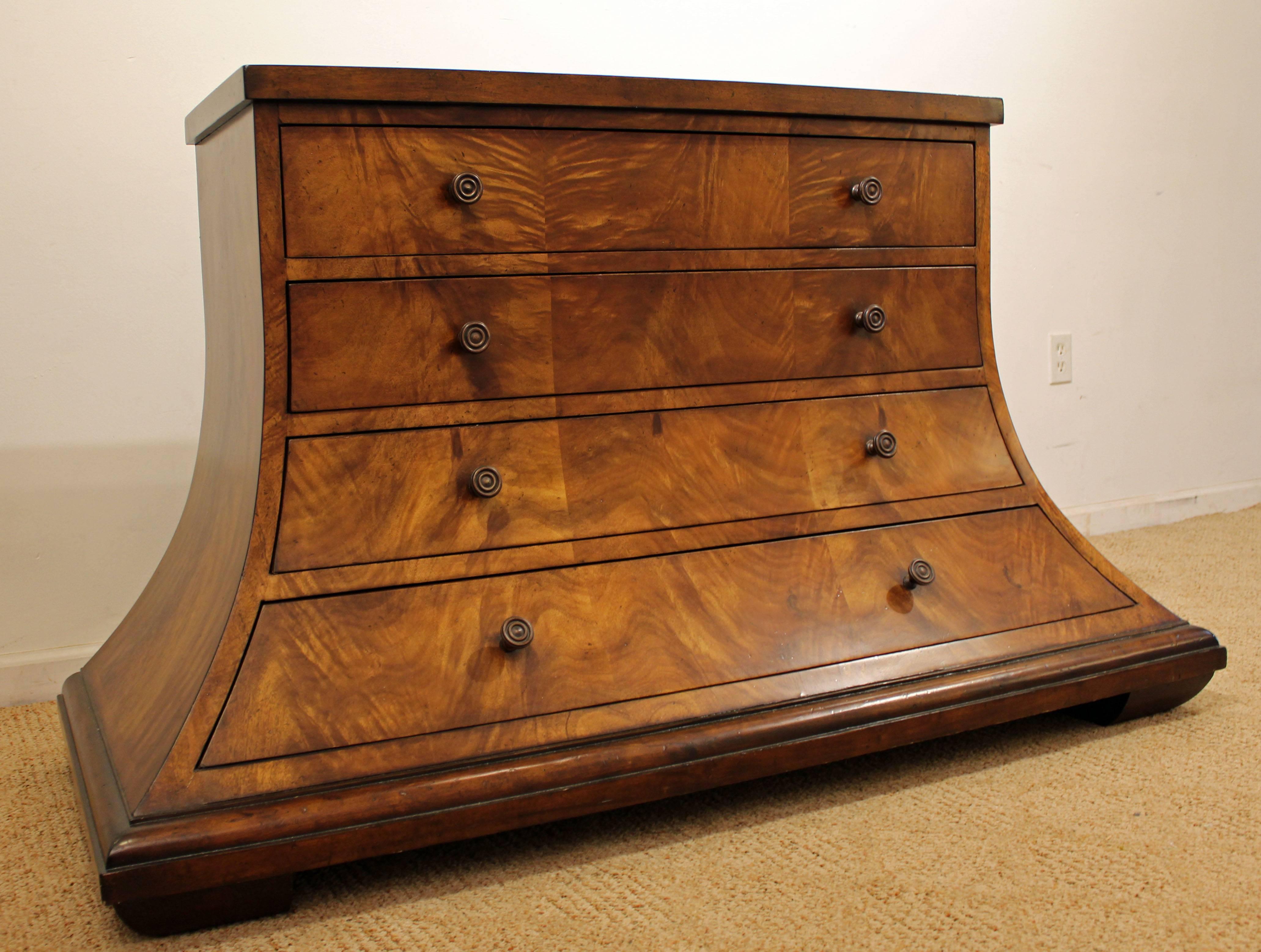 This is a very unique piece with a trapezoid shape and stone top. It looks to made with burl wood and a marble top, but we are not 100% sure. The piece is signed by Monarch Fine Furniture for Century.