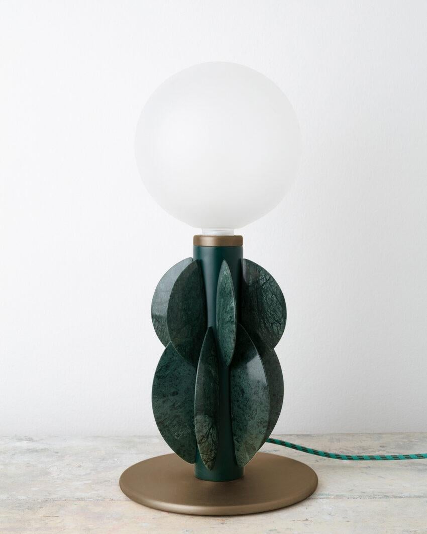 Monarch Guatemala Verde and Bronze Table Lamp with Glass Globe by Carla Baz
Dimensions: Ø 24 x H 50 cm.
Materials: Guatemala Verde marble, brushed bronze and glass.
Weight: 8,5 kg.

Monarch lighting series has been developed with the idea of