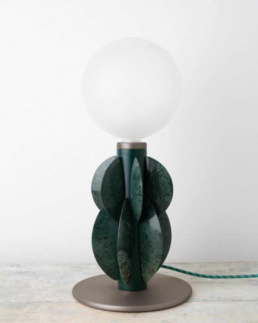 Monarch Guatemala Verde and Steel Table Lamp with Glass Globe by Carla Baz
Dimensions: Ø 24 x H 50 cm.
Materials: Guatemala Verde marble, brushed stainless steel and glass.
Weight: 8,5 kg.

Monarch lighting series has been developed with the idea of