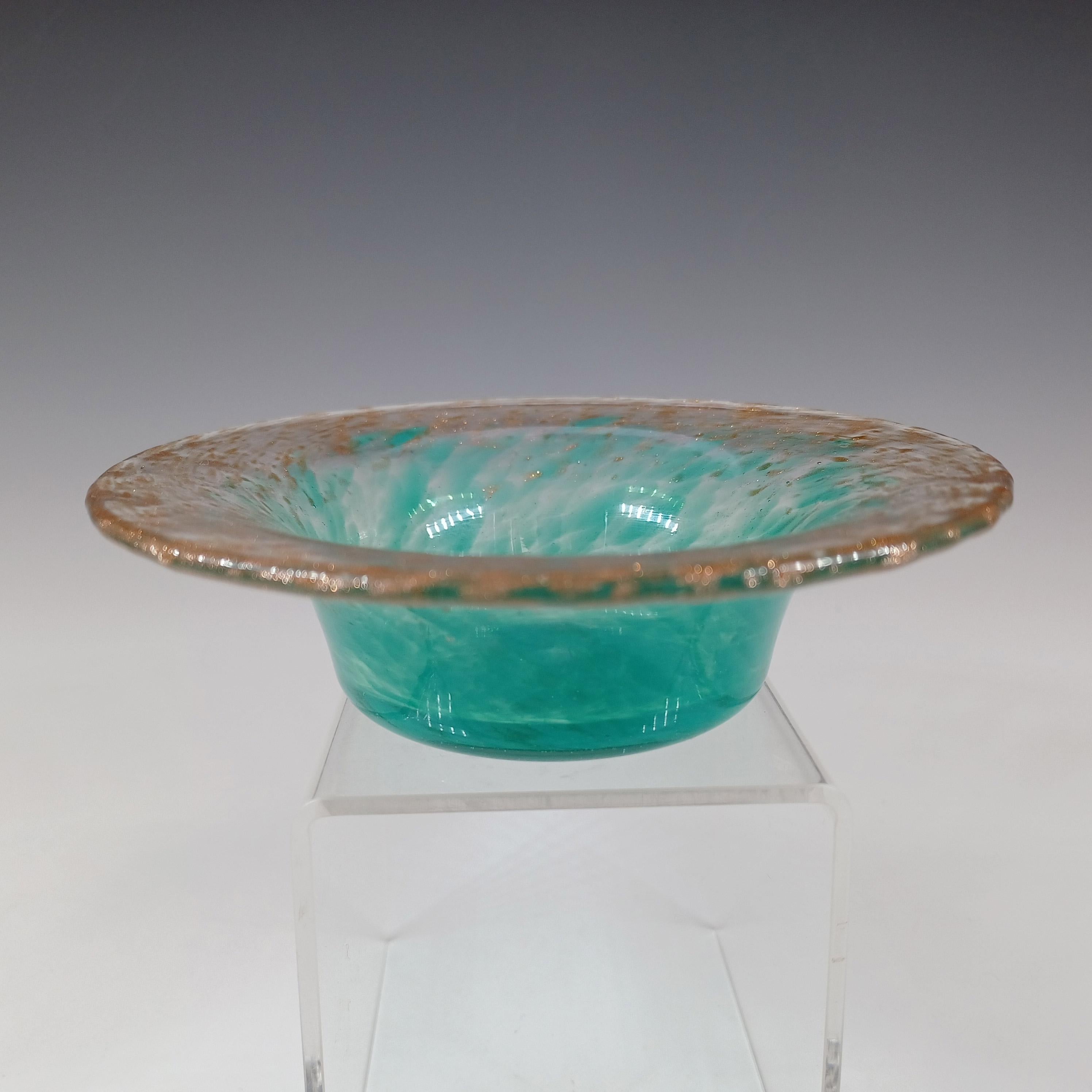 A Monart green & clear mottled glass bowl with speckles of copper aventurine. Made by the Scottish Moncrieff's factory in the 1930's/40's, pattern number UB.XI+. Breaking the pattern number down, UB is the shape number, and XI+ is the size (5 inch