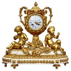 MONBRO Aîné Son & JACQUIER - Bronze- und Marmoruhr mit Puttis, XIX. Jahrhundert