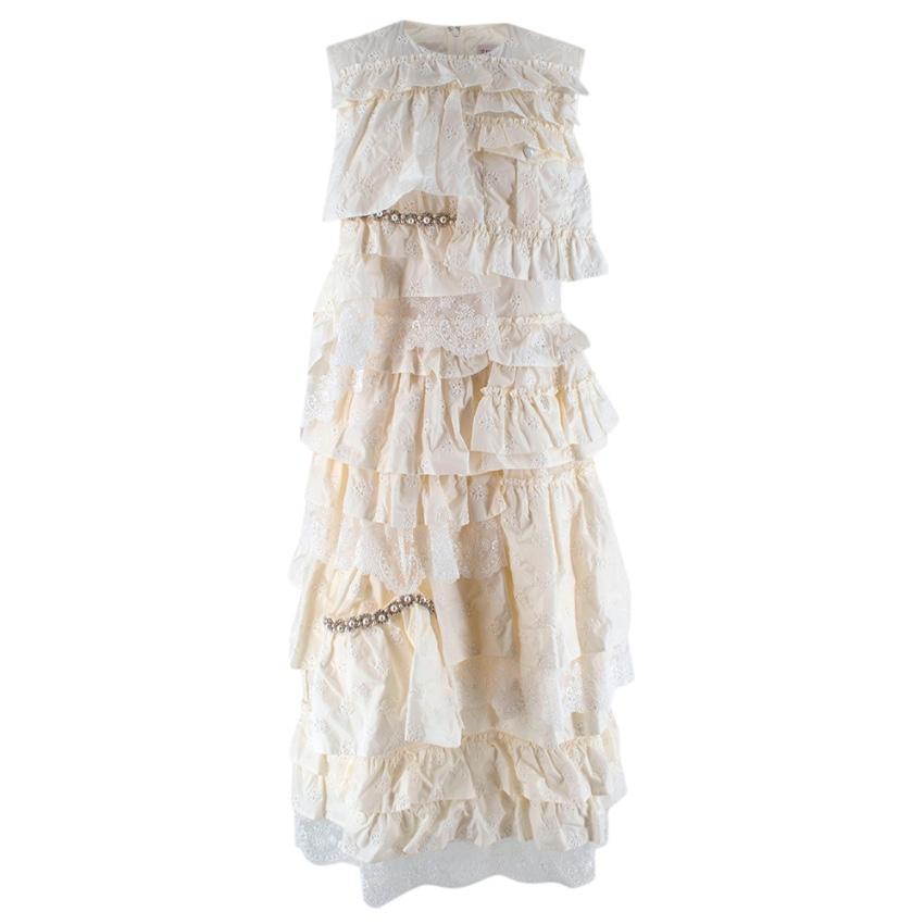 Moncler 4 Simone Rocha Lace-trimmed broderie-anglaise ruffled dress

-Made of gorgeous lace, depicting flowers 
-Ruffled layers construction 
-Pockets to the chest 
-Crustal and faux pearls details 
-Round neckline 
-Zip to the back 
-Lace trim to