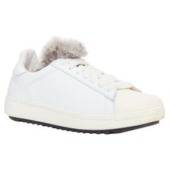 Moncler Angeline, scarpe da ginnastica in pelle bianca con bordo in pelliccia marrone, EU37