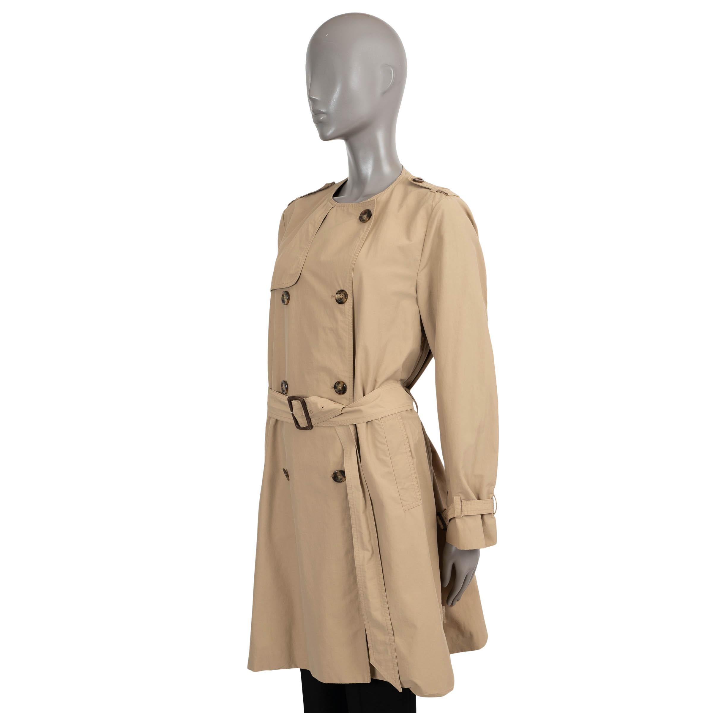 100% authentic Moncler collarless trench coat in beige cotton (50%) and polyamide (50%). Features Epaulettes, pockets at the waist, belted cuffs and matching belt. Closes with a double row of buttons. Unlined. Has been worn and is in excellent