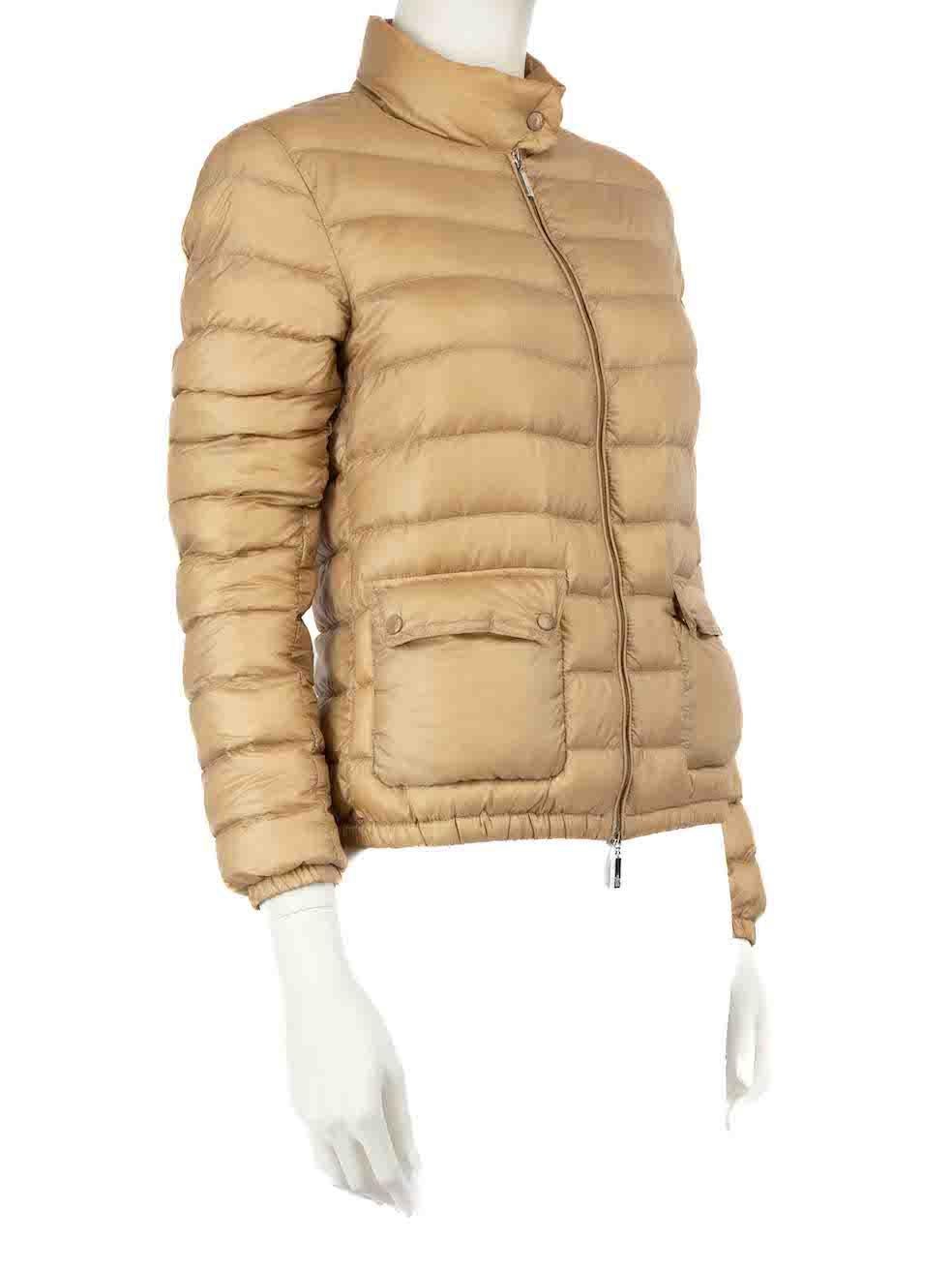 CONDITION is Very good. Minimal wear to coat is evident. Minimal wear to both underarms with slight darkening at the lining and small mark on the right sleeve on this used Moncler designer resale item. This item comes with original bag.
 
 Details
