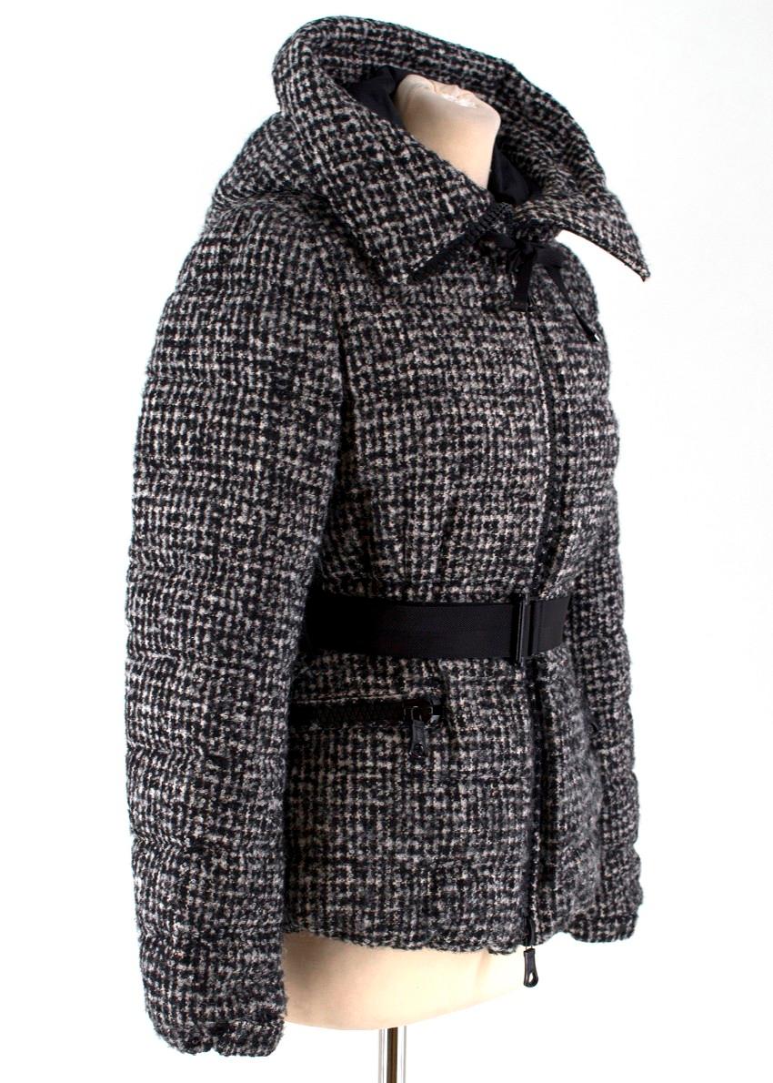 Moncler Black and White Tweed Coat

-Black and white tweed down coat
-Comes with black belt
-Black zip closure
-Two front zipped pockets
-Adjustable hood opening

Please note, these items are pre-owned and may show signs of being stored even when