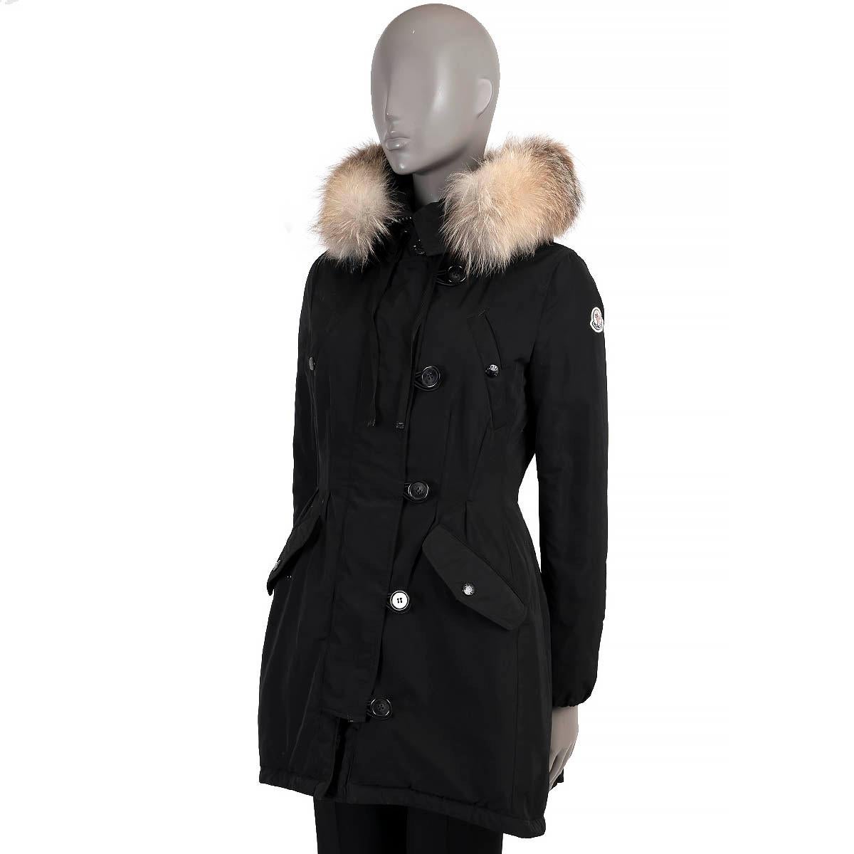 100% authentic Moncler Aredhel utilitarian parket in black water repellent polyester (70%) and cotton (30%). Features a drawstring hood with detachable fox fur trim,  two snap-button pockets at the chest and to snap-button flap pockets at the waist.