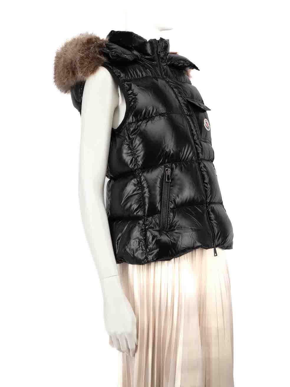 CONDITION is Very good. Hardly any visible wear to vest is evident on this used Moncler designer resale item.
 
 
 
 Details
 
 
 Balabio model
 
 Black
 
 Synthetic
 
 Puffer vest
 
 Padded and quilted
 
 Snap button removable hood
 
 Faux fur