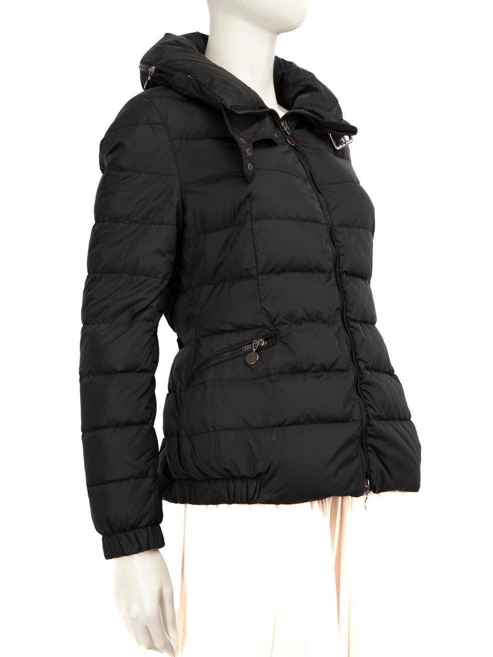 CONDITION is Very good. Minimal wear to coat is evident. Minimal wear to all hardware with tarnishing to metal. The inside comic tag has loose threads on this used Moncler designer resale item.
 
 
 
 Details
 
 
 Black
 
 Synthetic
 
 Coat
 
 Down