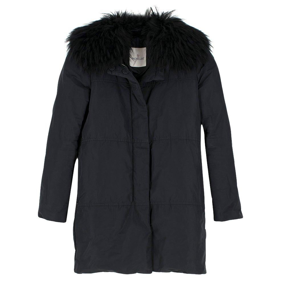 Moncler Black Down Coat with Fur Collar

- Padded down coat 
- Functioning pockets
- Detachable fur collar; authentic raccoon fur
- Functioning zipper and fabric-covered buttons

Please note, these items are pre-owned and may show signs of being