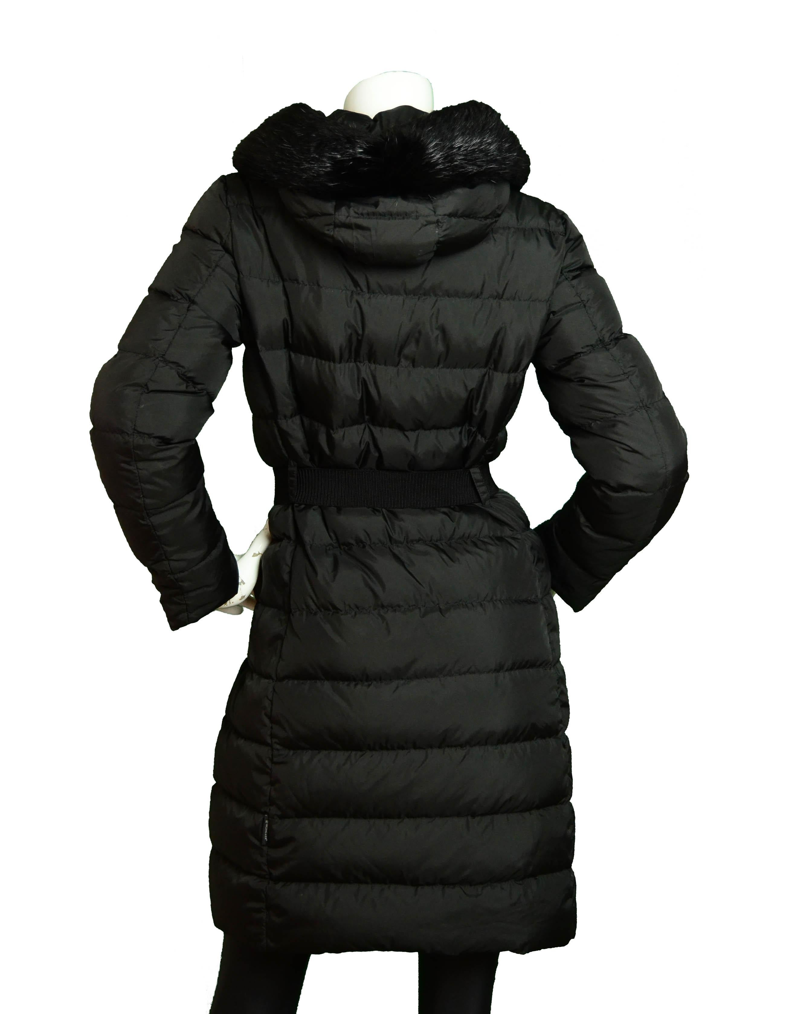 Moncler Black Fabrefur Hooded DownCoat W/Belt & Detachable Fur Trim

Made In: Republic of Moldova
Color: Black
Materials: 100% Polyester
Lining: Nylon, Down
Opening/Closure: Zipper
Overall Condition: Very good - wear to zipper pull
Estimated Retail: