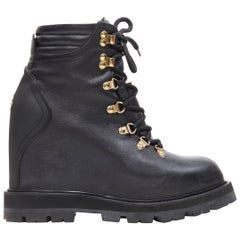 MONCLER schwarzer Lederstiefeletten mit tiefem Absatz und Keil in Paltform aus Leder EU38