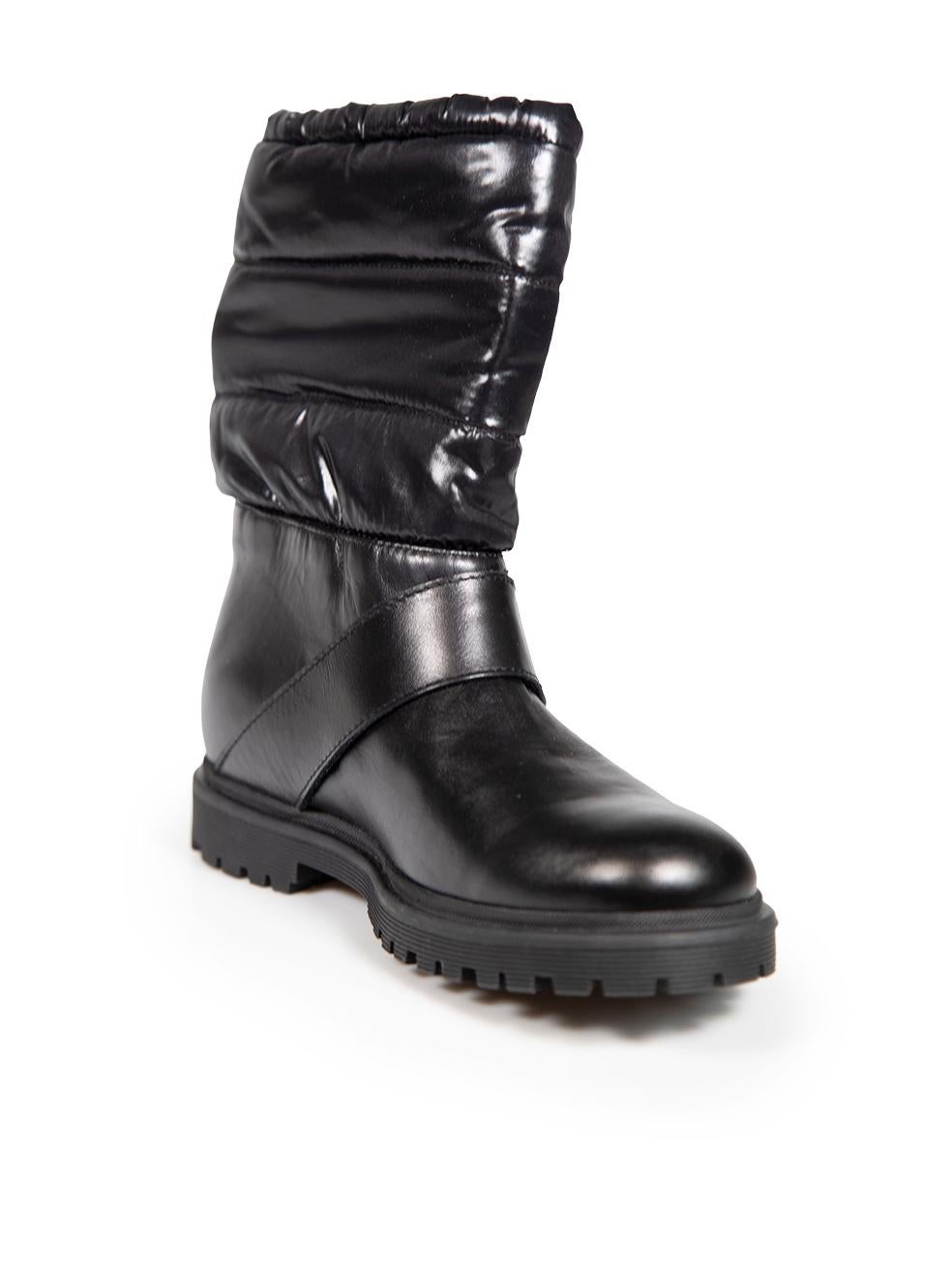 CONDITION is Never worn. No visible wear to boots is evident on this new Moncler designer resale item.
 
 
 
 Details
 
 
 Black
 
 Leather
 
 Snow boots
 
 Synthetic puffer top panel
 
 Drawstring tie
 
 Round toe
 
 Velcro strap
 
 
 

 
 Made in