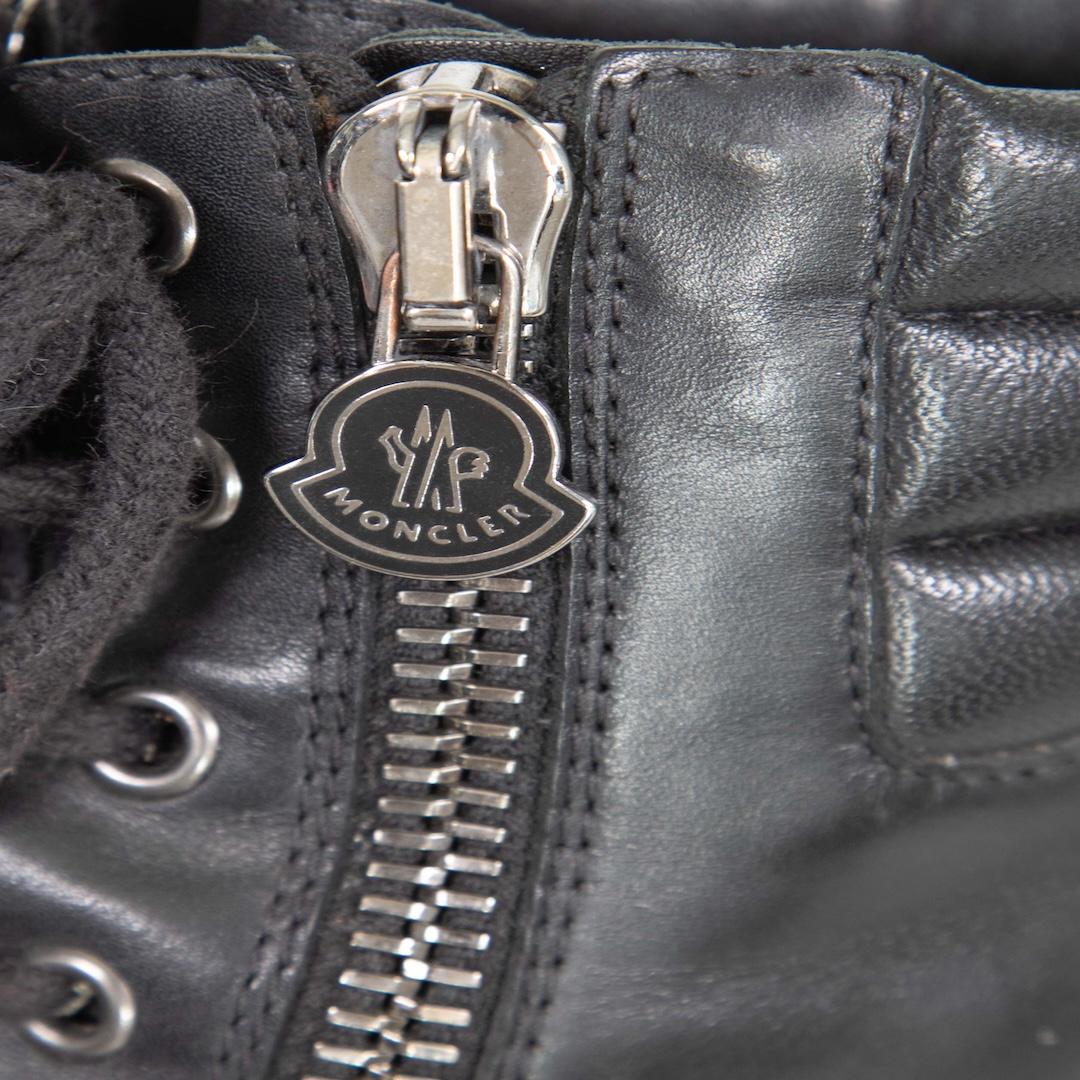 Moncler Bottes de combat en cuir noir avec fermeture éclair Taille IT 39 Pour femmes en vente