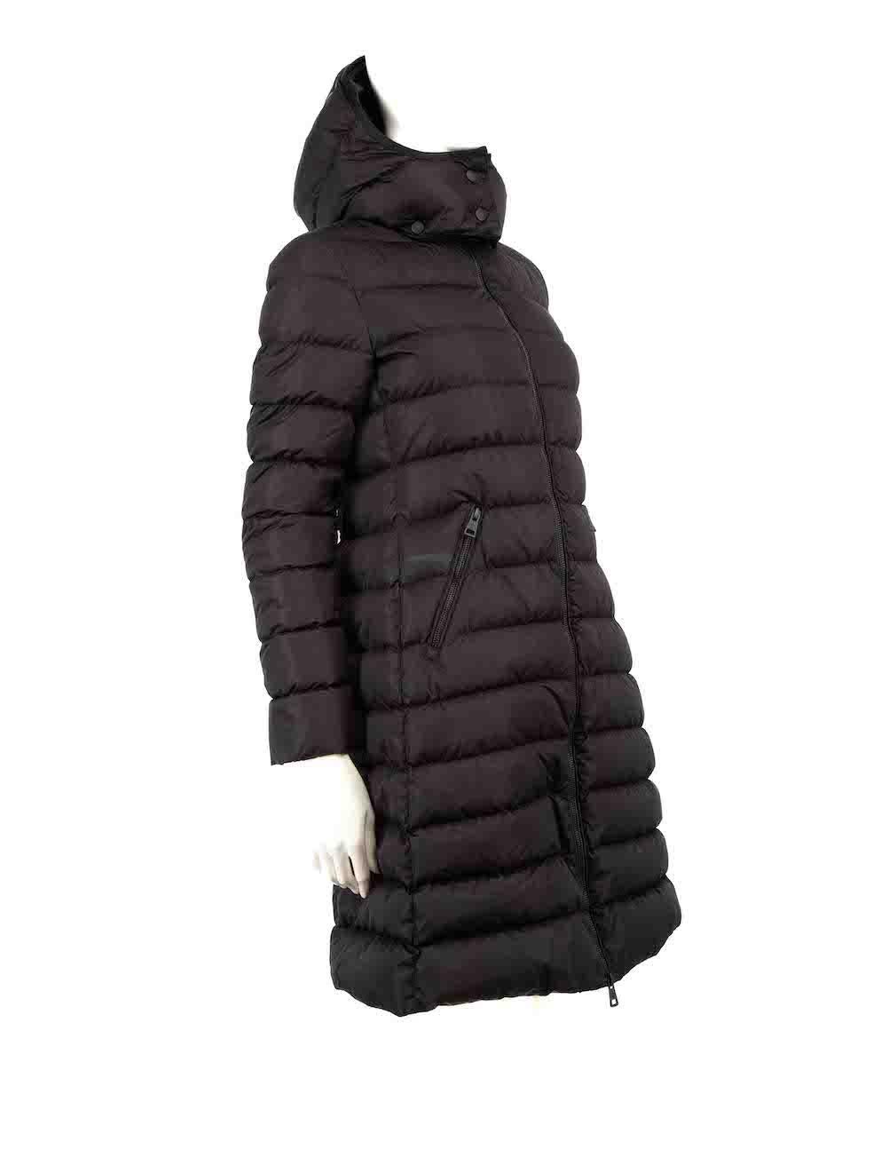 CONDITION is Good. Minor wear to coat is evident. Light marks around the right zip pocket, sides and inner collar of the coat. Small scratches on the inner lining , sides and on the left shoulder area. Overall pull to tread on the front, back and