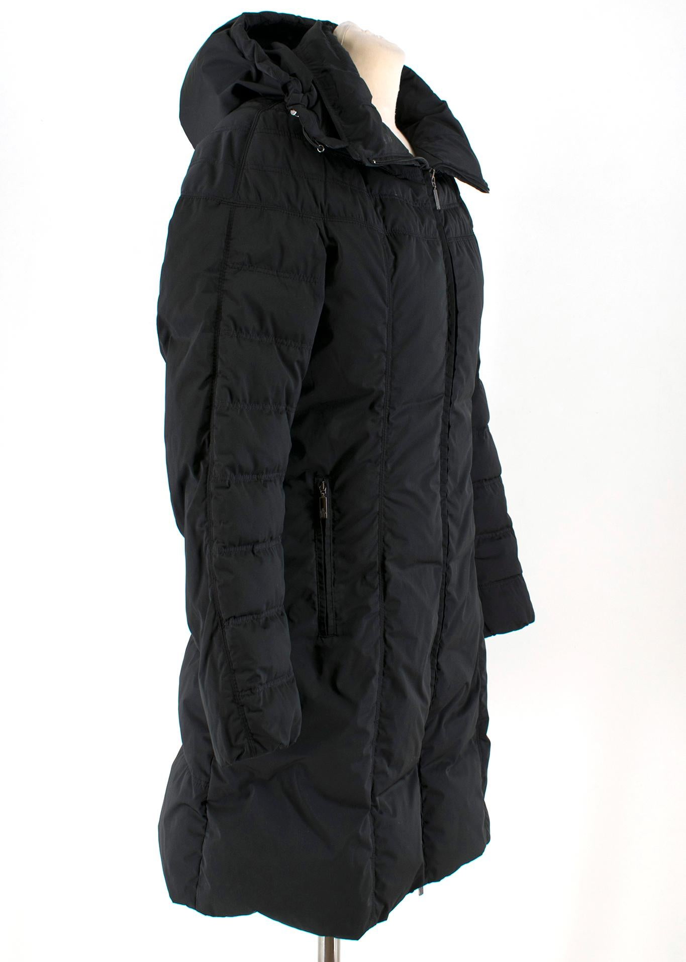 Moncler Black Long Down Filled Hooded Jacket

- Long black jacket with hood
- Mid-Heavy weight 
- Zip fastening at the front 
- Two front pockets 

Please note, these items are pre-owned and may show some signs of storage, even when unworn and