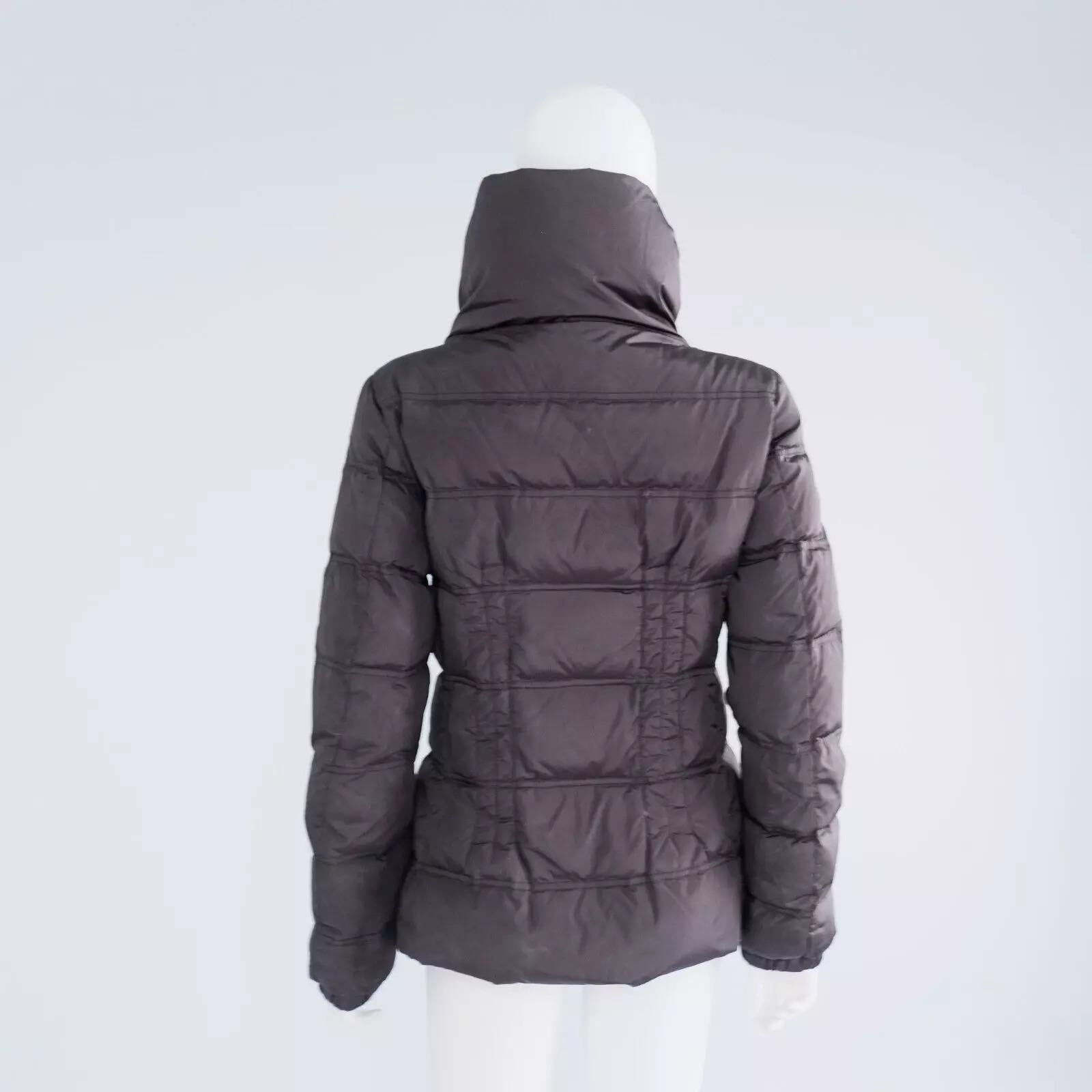 Moncler jackets typically have a tag or care label inside the jacket that specifies the exact materials. Based on Moncler's common designs:

Exterior Material: Most Moncler puffer jackets are made from polyamide (Nylon) or polyester. These materials