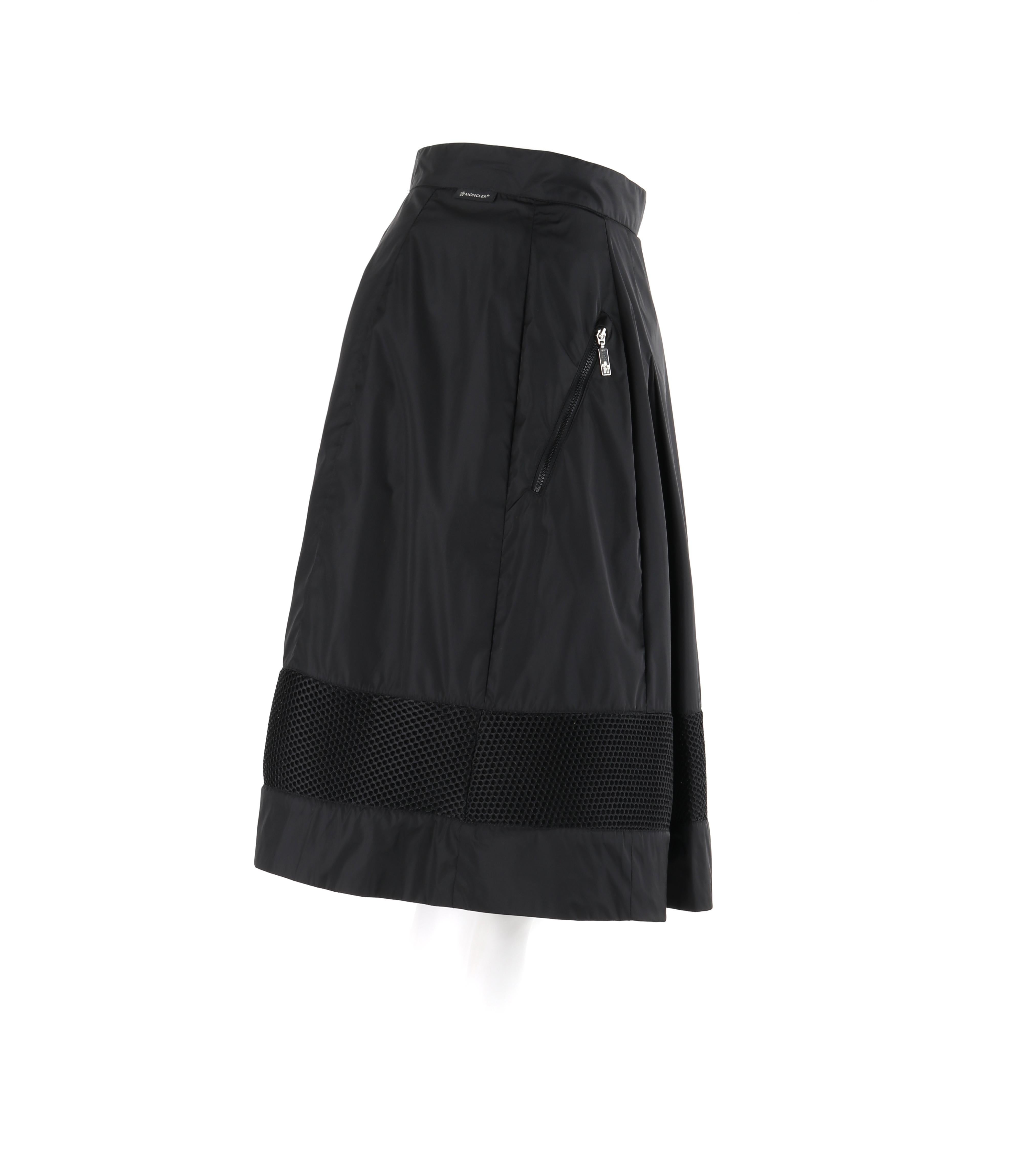 MONCLER c.2009 Nylon Black Mesh Stripe Zip Pocket Pleated Knee Length Skirt In Good Condition For Sale In Thiensville, WI