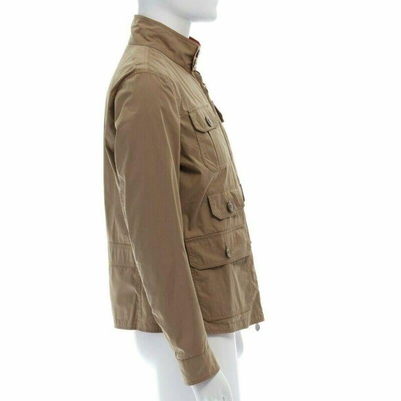 Uomo MONCLER Colisee, giacca da campo reversibile in cotone beige con tasca a patta e foderata in nylon rosso in vendita