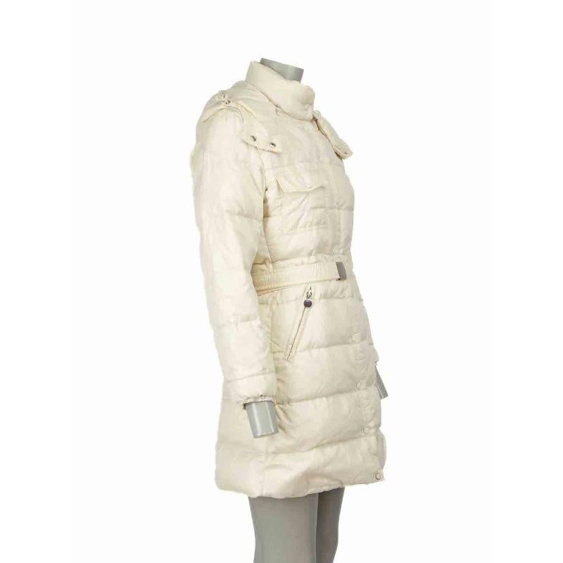 CONDITION is Good. General wear to coat is evident. Moderate signs of wear to overall coat with chipping of paint on buttons, discoloured marks to lining, chipping to motif on zips and minor pilling to lining. This coat comes with original belt