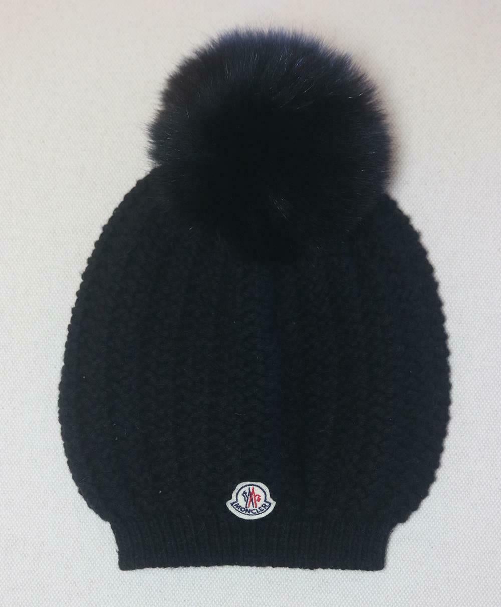 Moncler's black knitted hat features the label's logo on the trim, it's made from wool-blend in a reassuring chunky knit and finished with a matching fox fur pom pom, so you'll stay warm no matter how cold it gets.
Black wool-blend, black fox