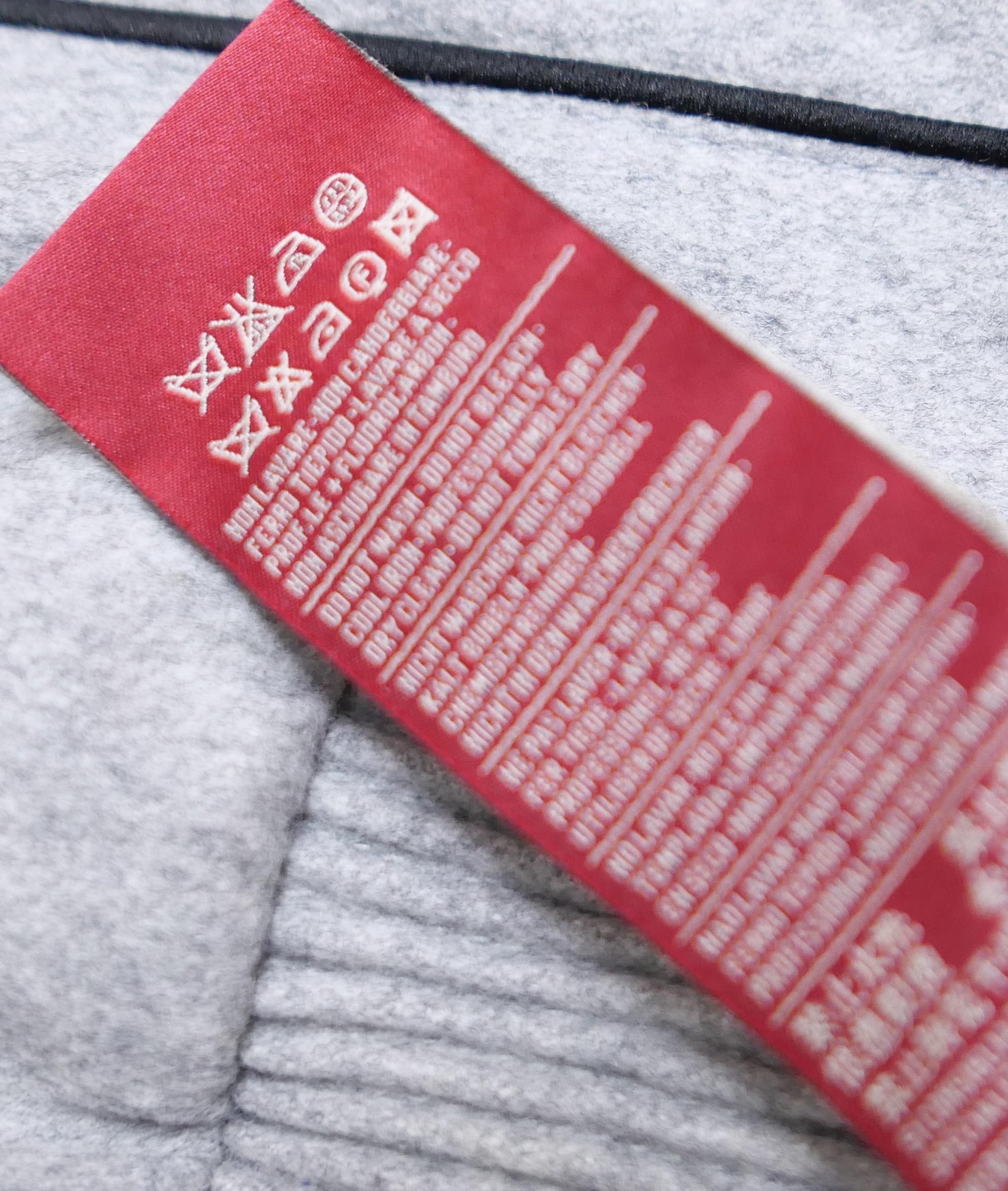 Moncler Gamme Rouge - Giacca trapuntata in lana grigia con fiocco sul davanti in vendita 5
