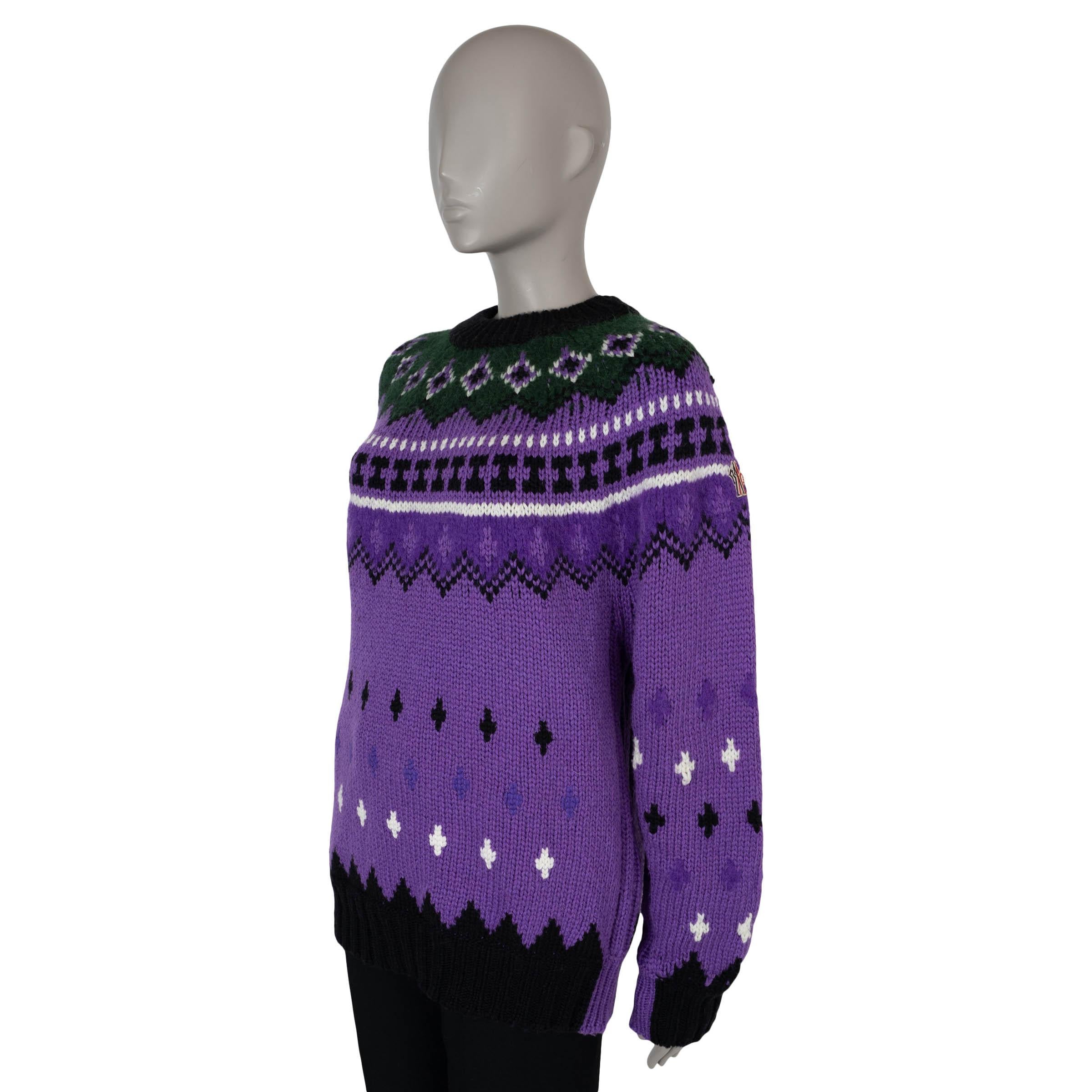 This 100% authentic Moncler Grenoble Fire Isle sweater in electric purple, dark green, black, and white wool (64%), alpaca (24%), and polyamide (12%) exudes bold après-ski style. Featuring an intarsia knit design with brushed panels, it boasts an