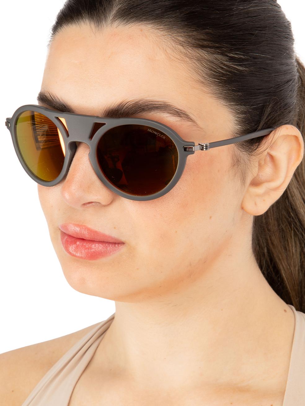 CONDITION is New with tags on this brand new Monclerdesigner item. This item comes with original packaging.
 
 
 
 Details
 
 
 Model: ML0053 20C
 
 Grey
 
 Acetate
 
 Round Eye Sunglasses
 
 Mirrored Orange Lens
 
 Branding at the arms
 
 Full-Rim
