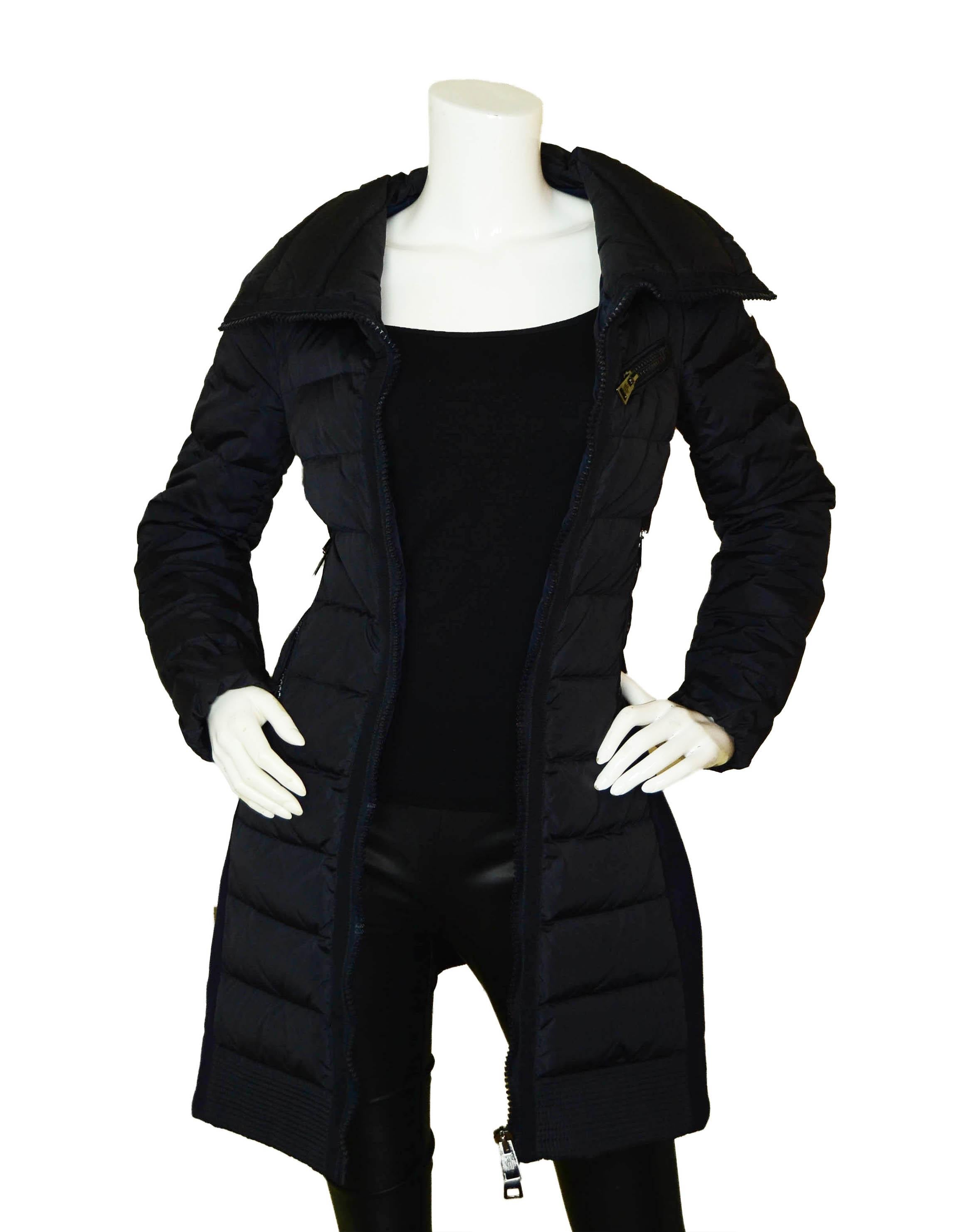 Moncler Herisse Navy Down Puffer Coat w/Knit Inserts

Made In: Bulgaria
Color: Navy
Materials: 100% Polyamide/100% Wool inserts
Lining: Nylon
Opening/Closure: 2-Way zipper
Overall Condition: Excellent

Tag Size: Designer 00/ US XXS *Please refer to