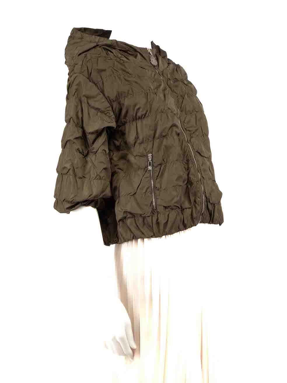 CONDITION is Very good. Minimal wear to jacket is evident. One small mark to the front right pocket area on this used Moncler designer resale item.
 
 
 
 Details
 
 
 Salome model
 
 Khaki
 
 Synthetic
 
 Windbreaker jacket
 
 Ruched accent
 
