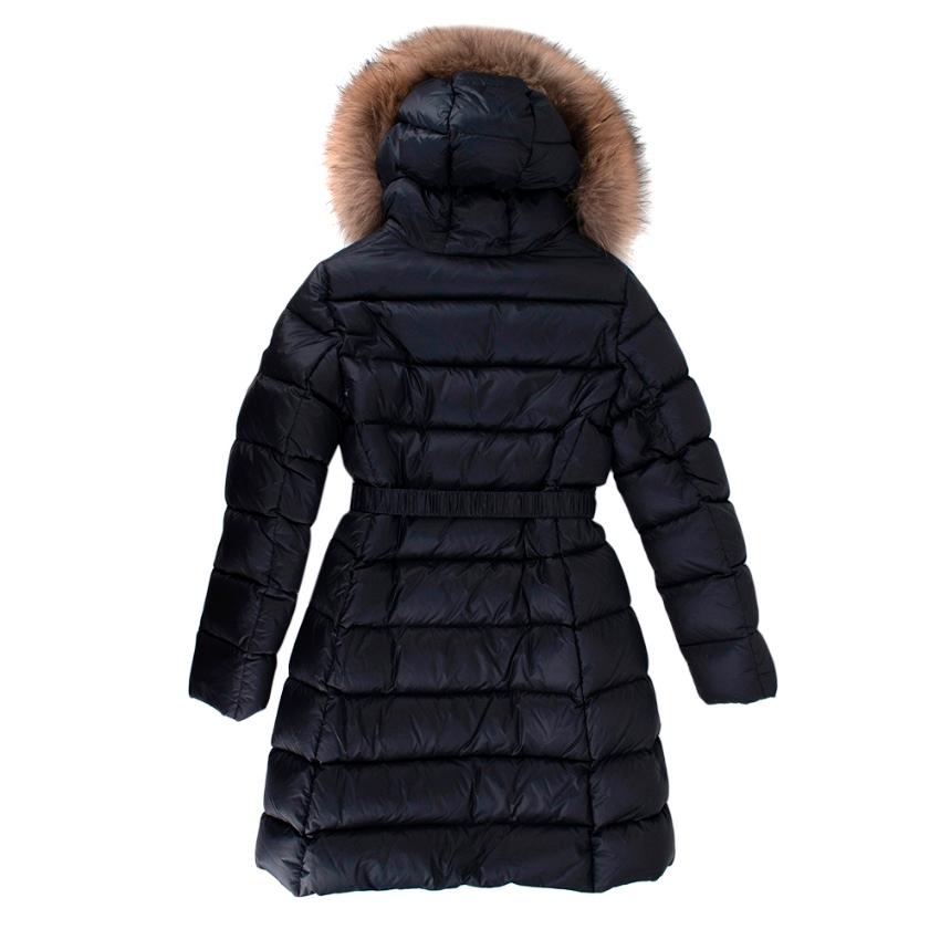 Moncler Navy Fur Trimmed Belted Down Coat

- Luxurious soft fur trim to the hood 
- Iconic logo patch to the shoulder 
- Gorgeous neutral navy hue 
- Elasticated logo belt to the waist 
- Zipped pockets to the sides 
- 2 way zip fastening to the