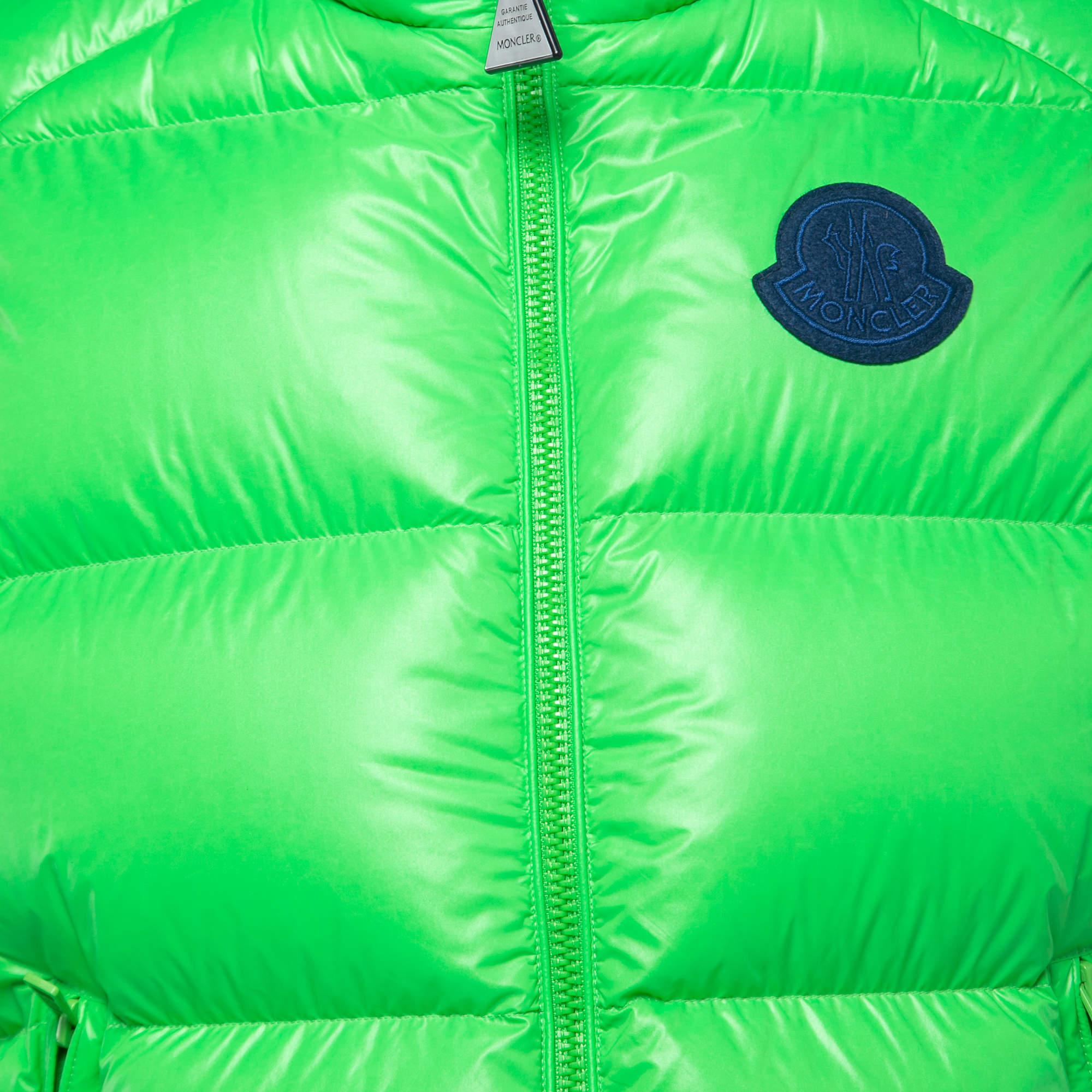 The Moncler vest is a stylish outerwear piece. Crafted from high-quality nylon, it features a green design with the iconic logo patch prominently displayed. This sleeveless puffer vest combines fashion and functionality, making it perfect for
