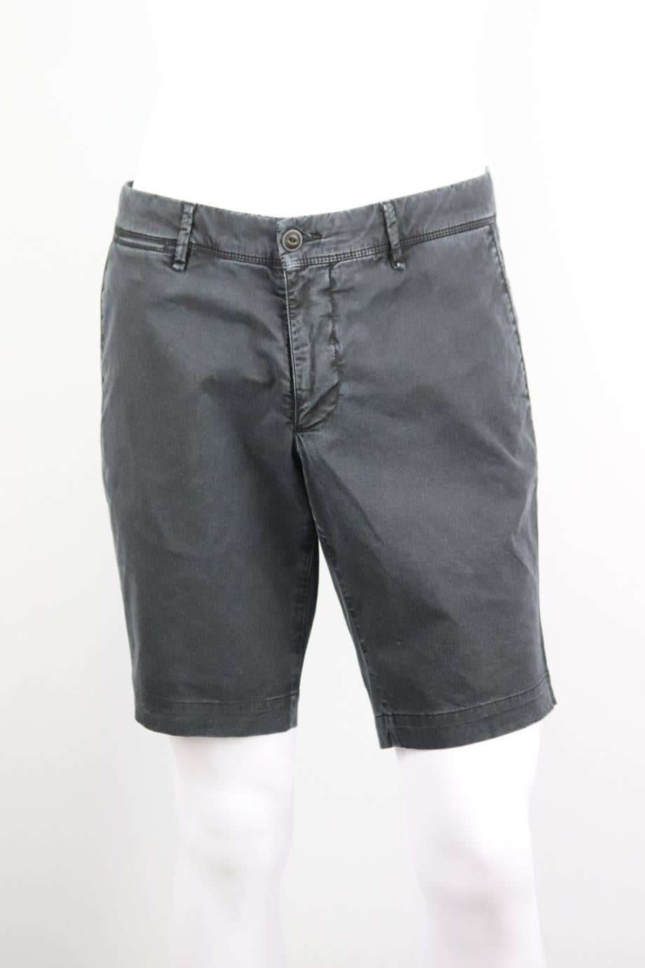 Moncler men’s distressed stretch cotton shorts. Black. Button and zip fastening at front. 98% Cotton, 2% elastane. Size: UK/US Waist 34 (Large, IT 50). Waist: 34 in. Hips: 40 in. Length: 17.5 in. Inseam: 10 in. Rise: 8.5 in
