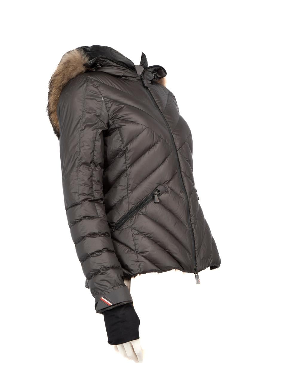 CONDITION is Very good. Minimal wear to coat is evident. Minimal wear to the inside right cuff where some discolouration can be seen. The trim around the edge of the two front pockets is peeling away and there is some tarnishing on the centre front