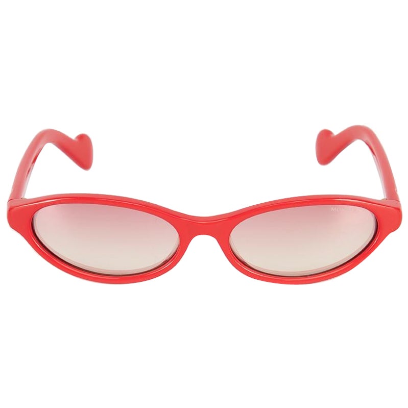 Gafas de sol Moncler rojas ovaladas degradadas en venta