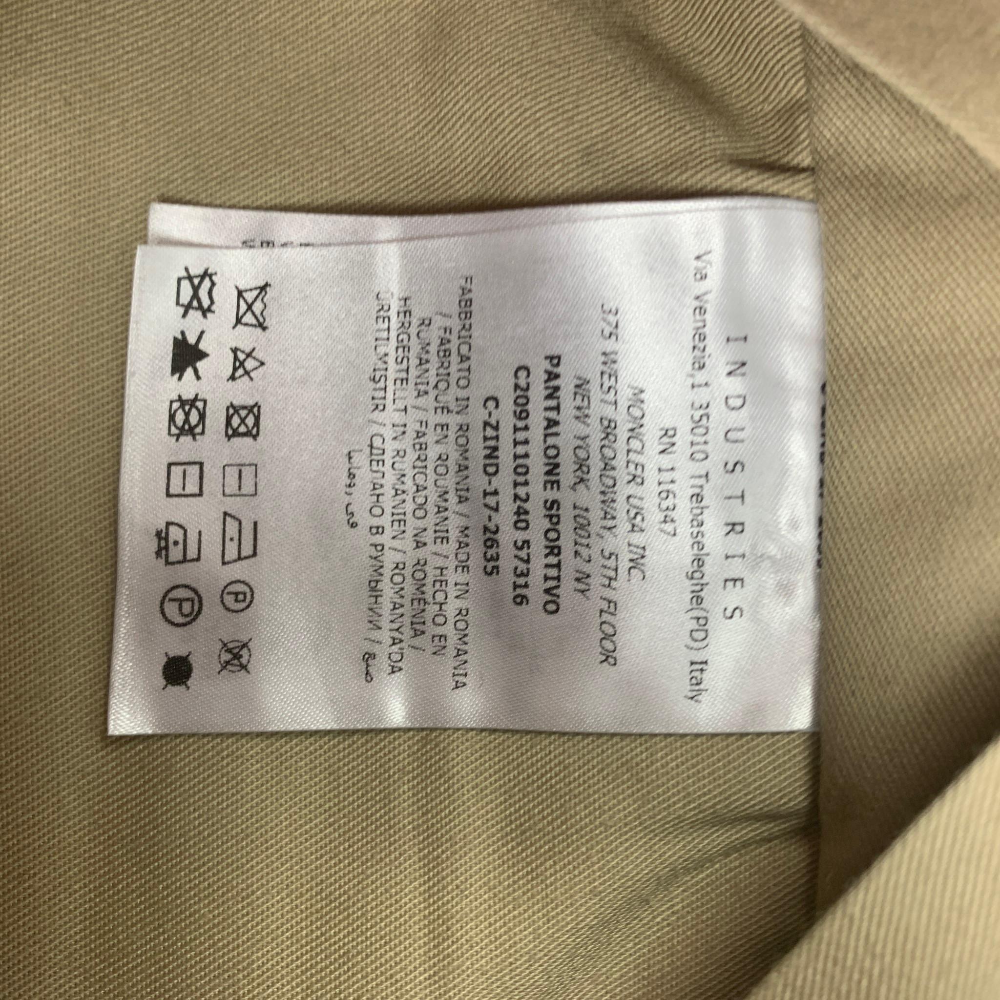 MONCLER Size 32 Navy Blue Virgin Wool Pleated Dress Pants In Good Condition In San Francisco, CA