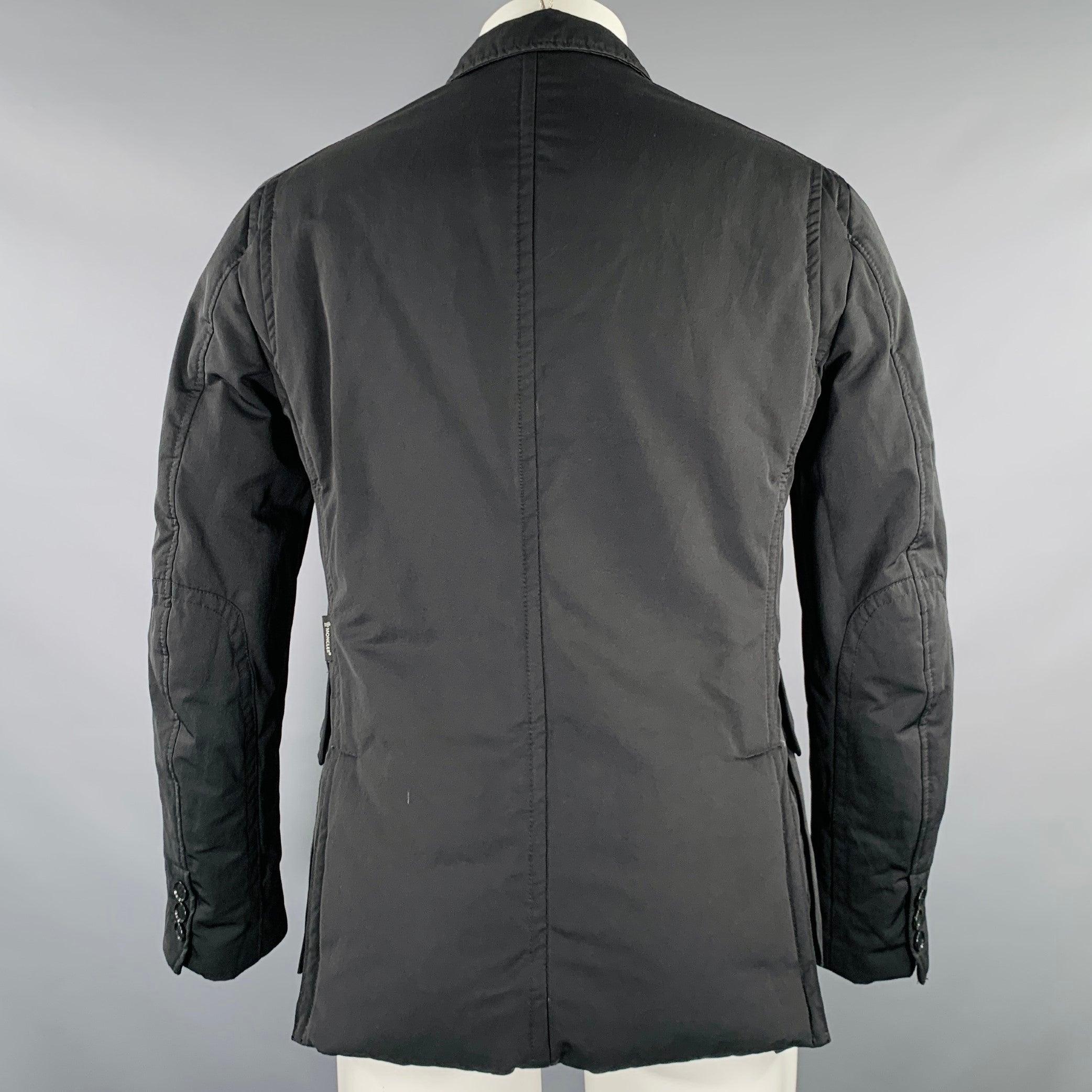 Nero Moncler Giacca con bottoni e zip in poliestere nero taglia M. in vendita