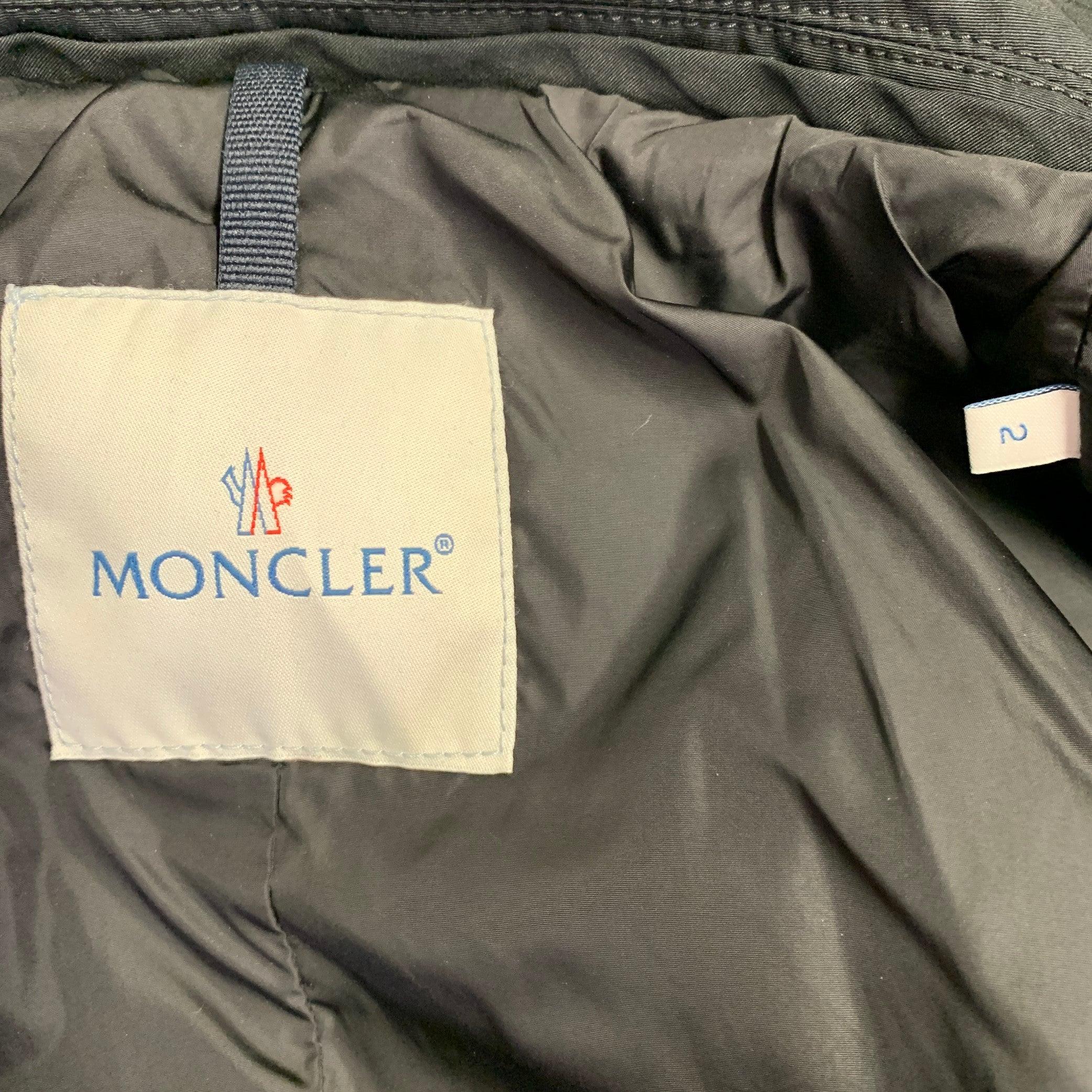 Uomo Moncler Giacca con bottoni e zip in poliestere nero taglia M. in vendita