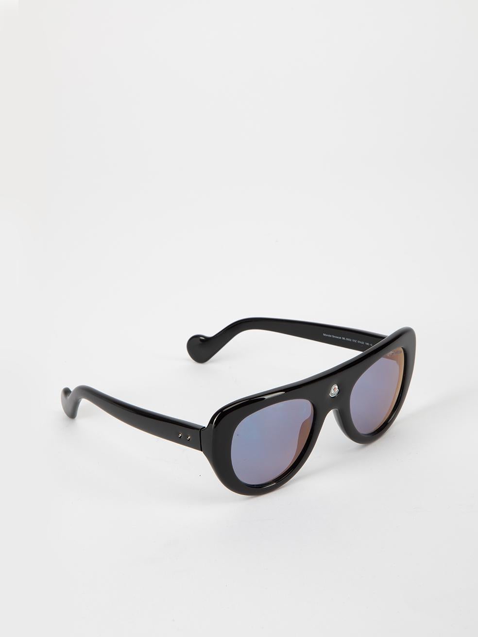 CONDITION is Very good. Minimal wear to sunglasses is evident. Minimal wear to the frame which is lightly scuffed on this used Moncler designer resale item. This item comes with original sunglasses case.   Details  Black Acetate Sunglasses Round