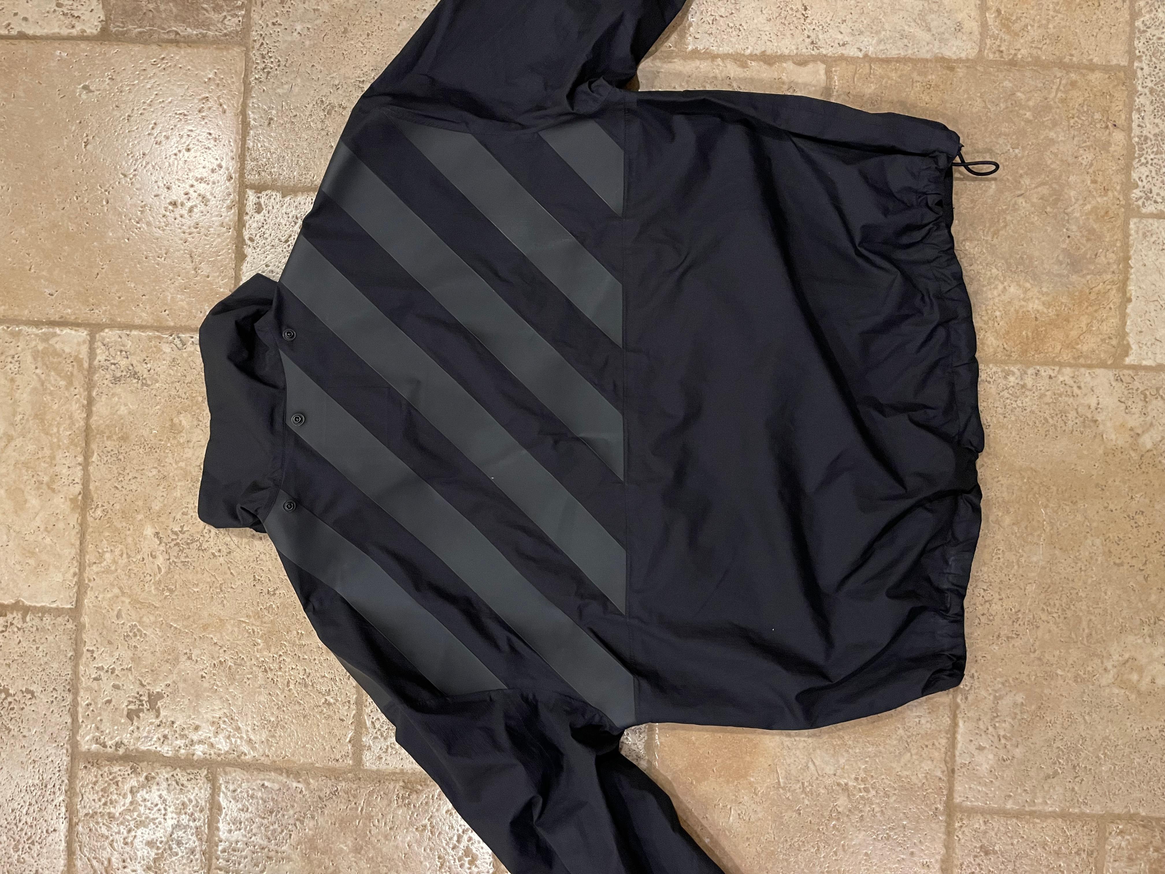 Moncler x Off White Donville Smock Black Windbreaker Jacket

Size 3

Great used condition (some small marks; could be removed easily by a dry clean)
Does not include the hood
Extremely rare Moncler x Off White OG collab piece. Grail piece
Retailed