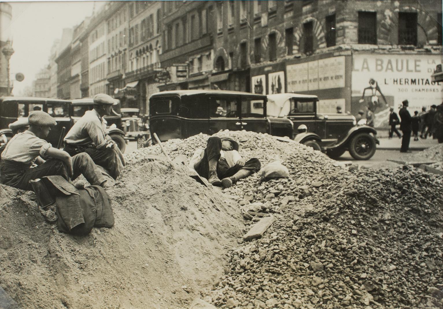 An original silver gelatin black and white photograph by Mondial Photo Presse, Paris, circa 1930. A construction site on a street in Paris.
Features:
Original silver gelatin print photograph unframed.
Press photograph.
Press agency: Mondial Photo