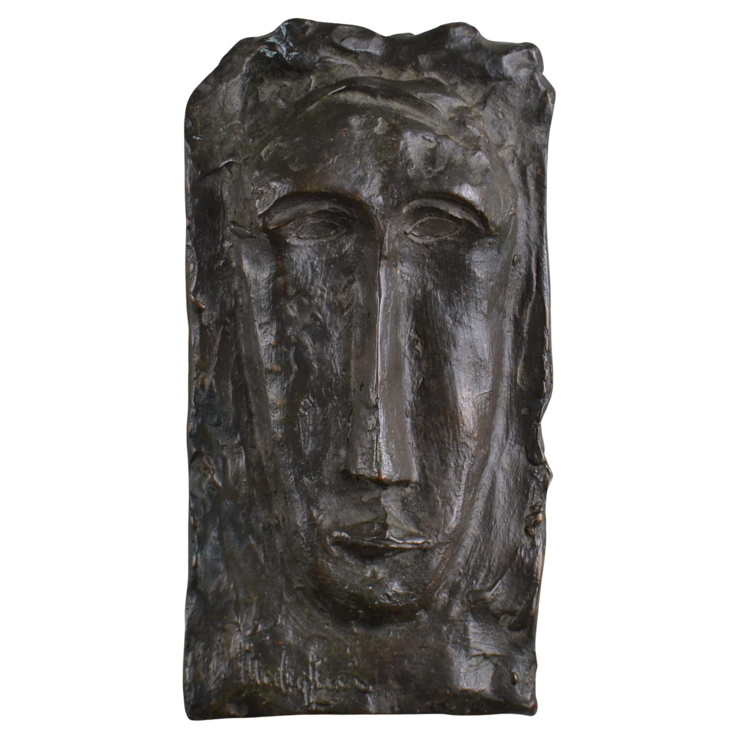 Mondigiani Style Bronze Relief of Face For Sale