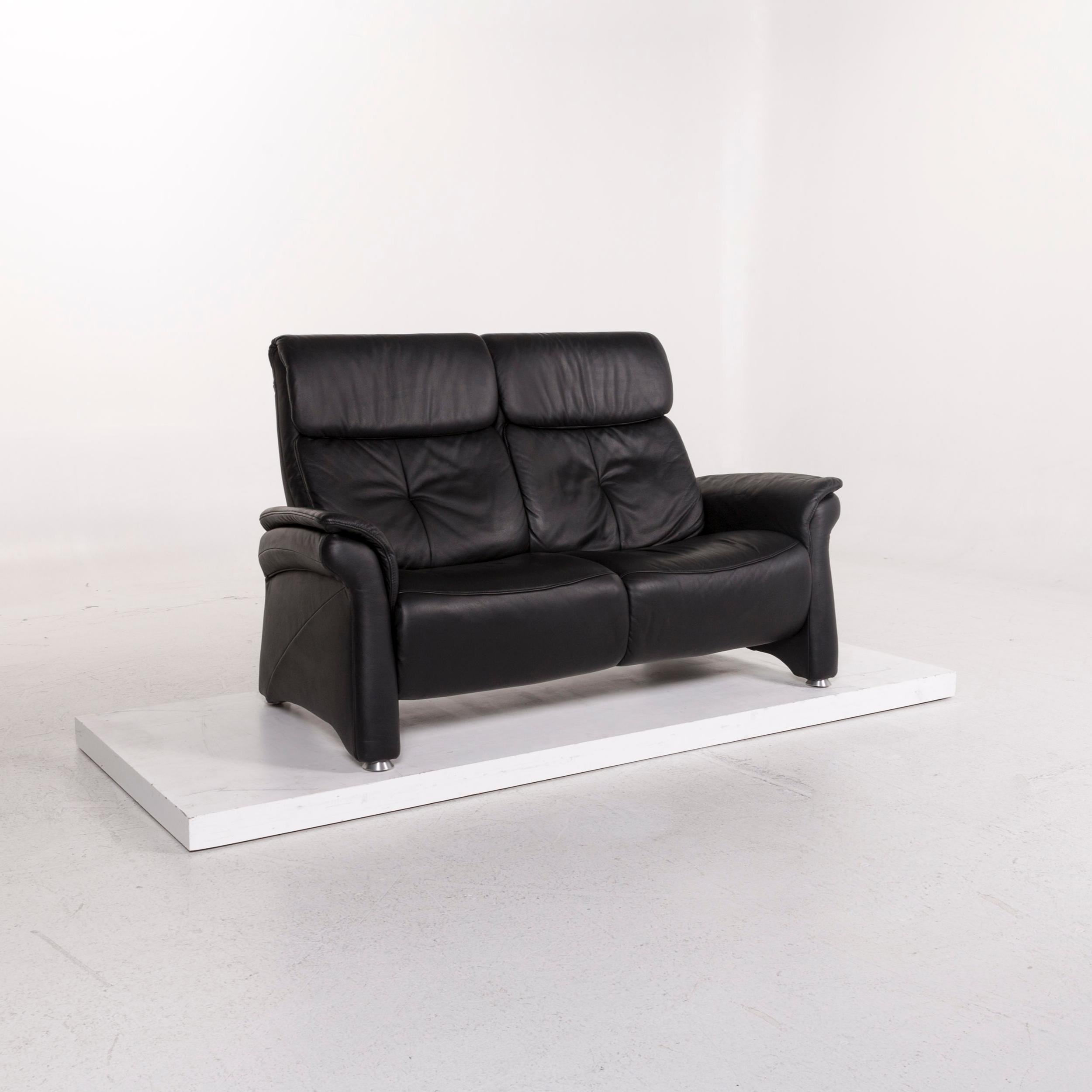 We bring to you a Mondo leather sofa black two-seat couch.

 

 Product measurements in centimeters:
 

Depth 86
Width 174
Height 107
Seat-height 44
Rest-height 62
Seat-depth 40
Seat-width 134
Back-height 65.