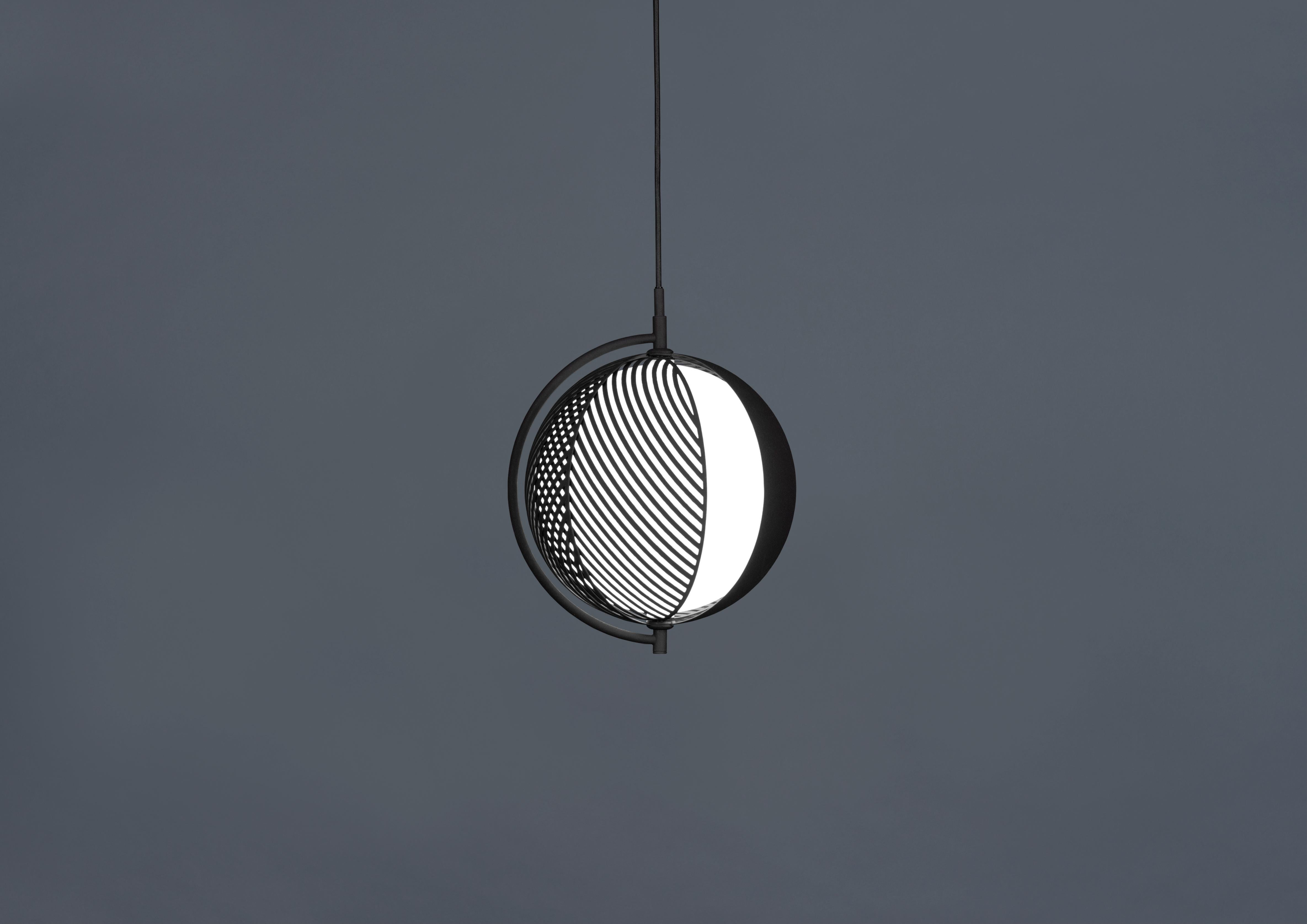 Mondo pendant lamp by Antonio Facco 
Dimensions: 36.5 x 28 cm (Ø)
Floor lamp with movable metal shades with pattern.
Mondo consist of four metal shades, mounted in pairs, overlapping each other which allow the beholder to interact with the lamp.